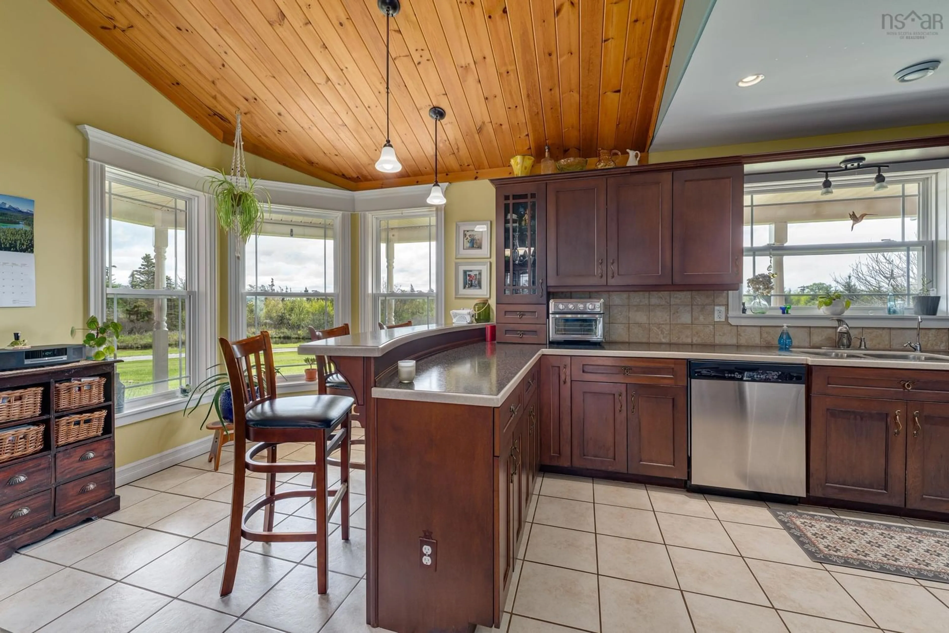 Open concept kitchen, ceramic/tile floor for 985 Main Shore Rd, North Chegoggin Nova Scotia B5A 5H2