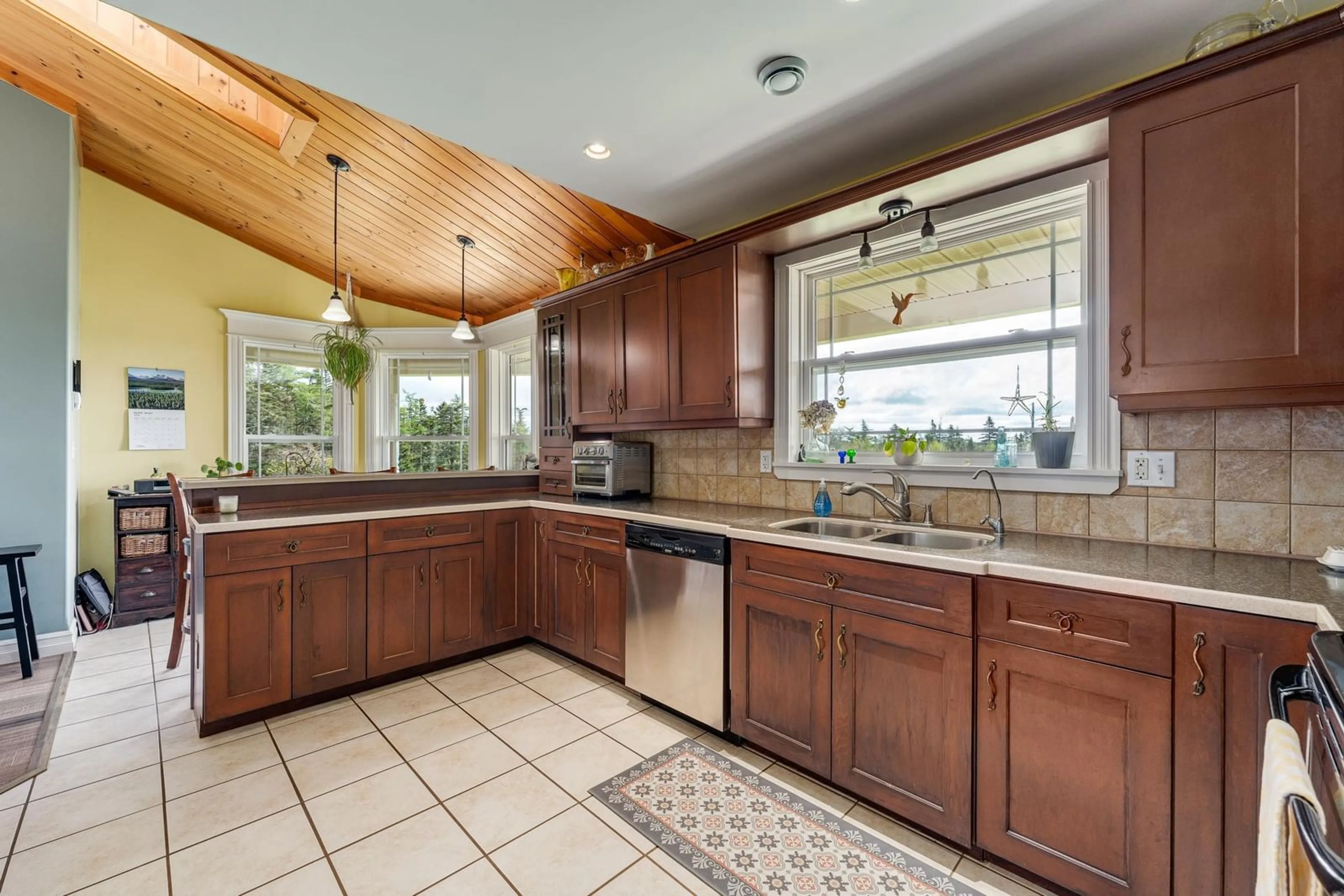 Open concept kitchen, ceramic/tile floor for 985 Main Shore Rd, North Chegoggin Nova Scotia B5A 5H2