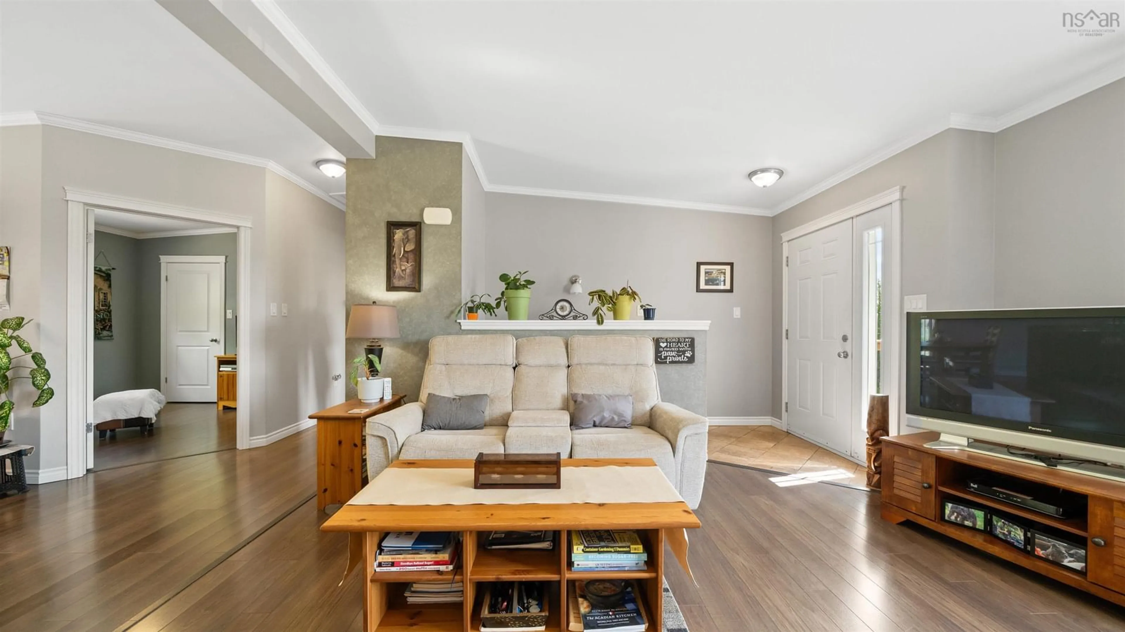 Living room with furniture, wood/laminate floor for 3243 Highway 4, Central West River Nova Scotia B0K 1P0