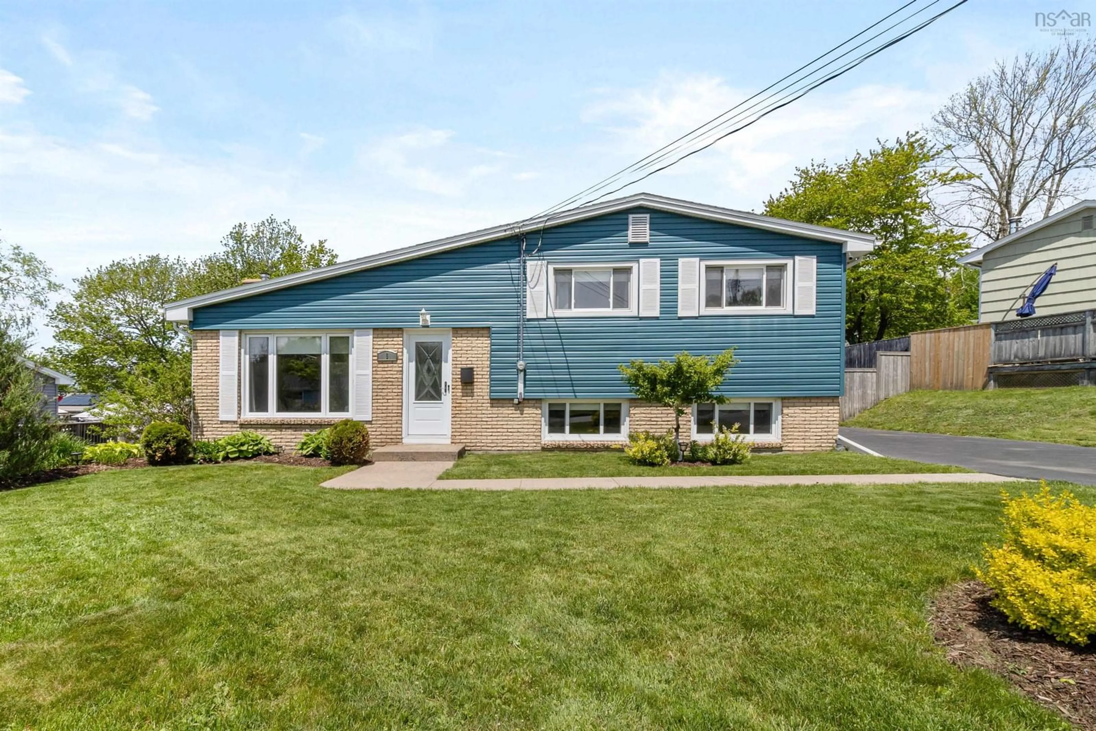 Home with vinyl exterior material, street for 6 Tummell Dr, Dartmouth Nova Scotia B2X 2A8