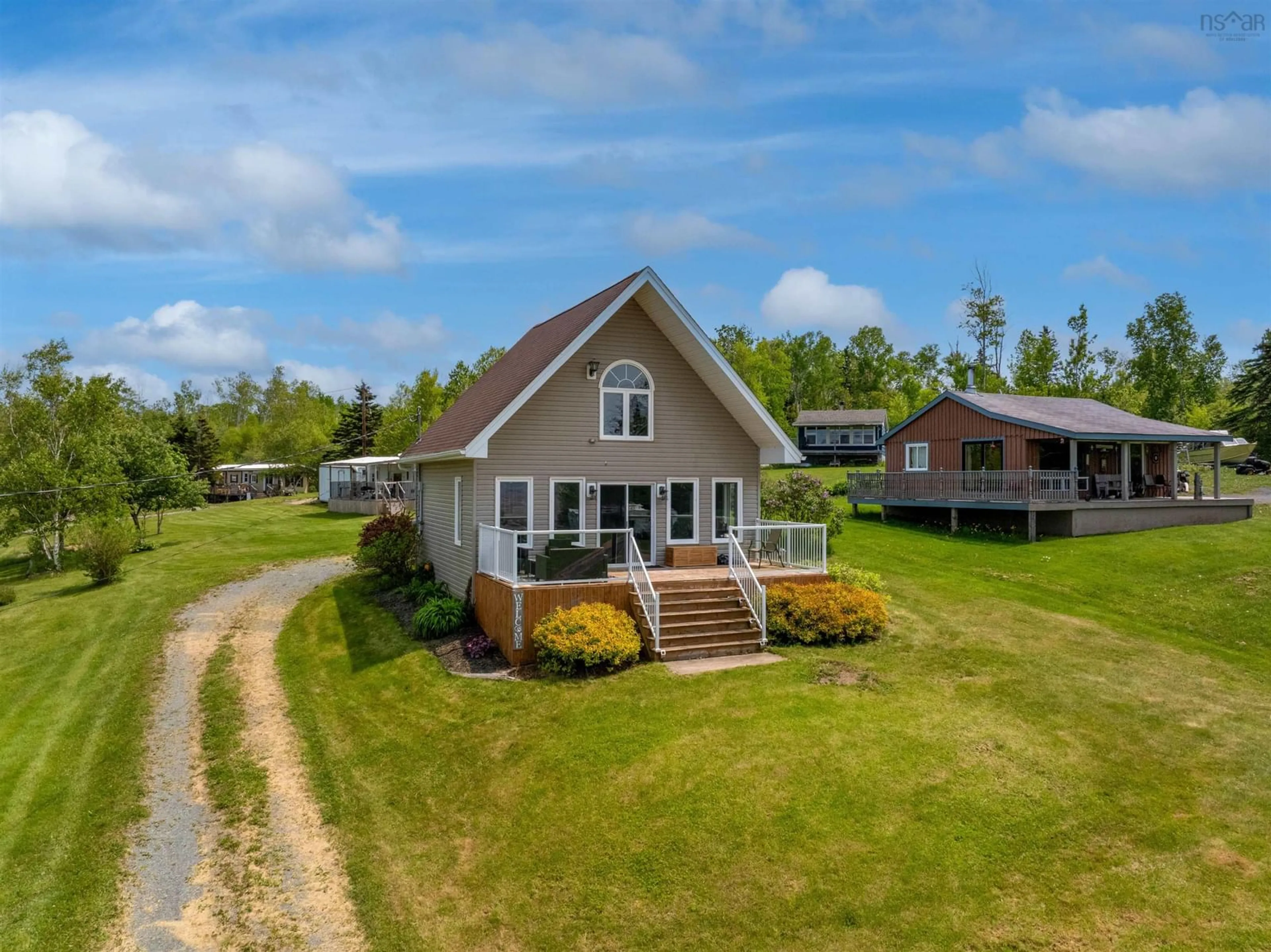A pic from outside/outdoor area/front of a property/back of a property/a pic from drone, water/lake/river/ocean view for 39 Blomidon View Lane, Bramber Nova Scotia B0N 2A0