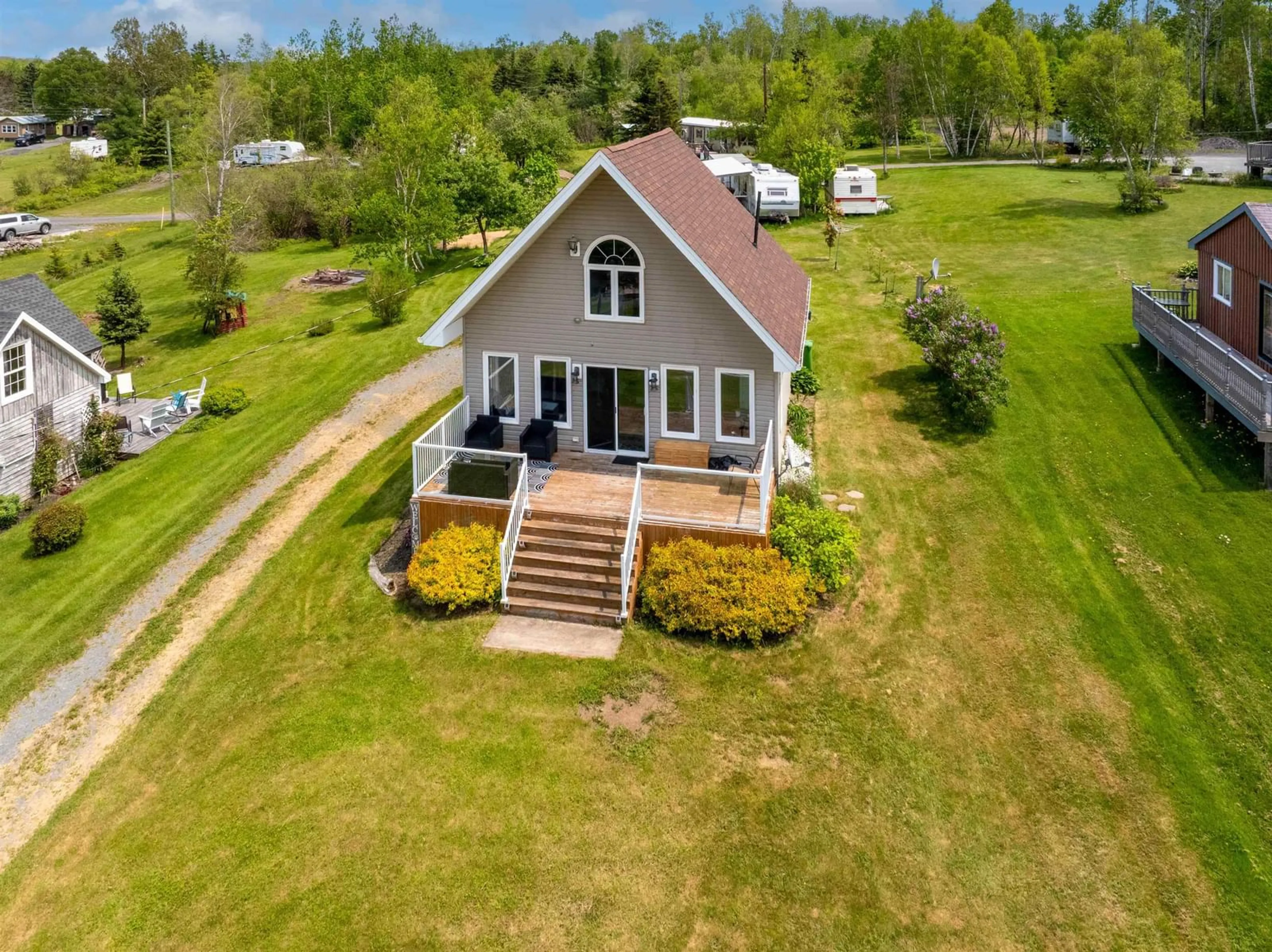 A pic from outside/outdoor area/front of a property/back of a property/a pic from drone, water/lake/river/ocean view for 39 Blomidon View Lane, Bramber Nova Scotia B0N 2A0