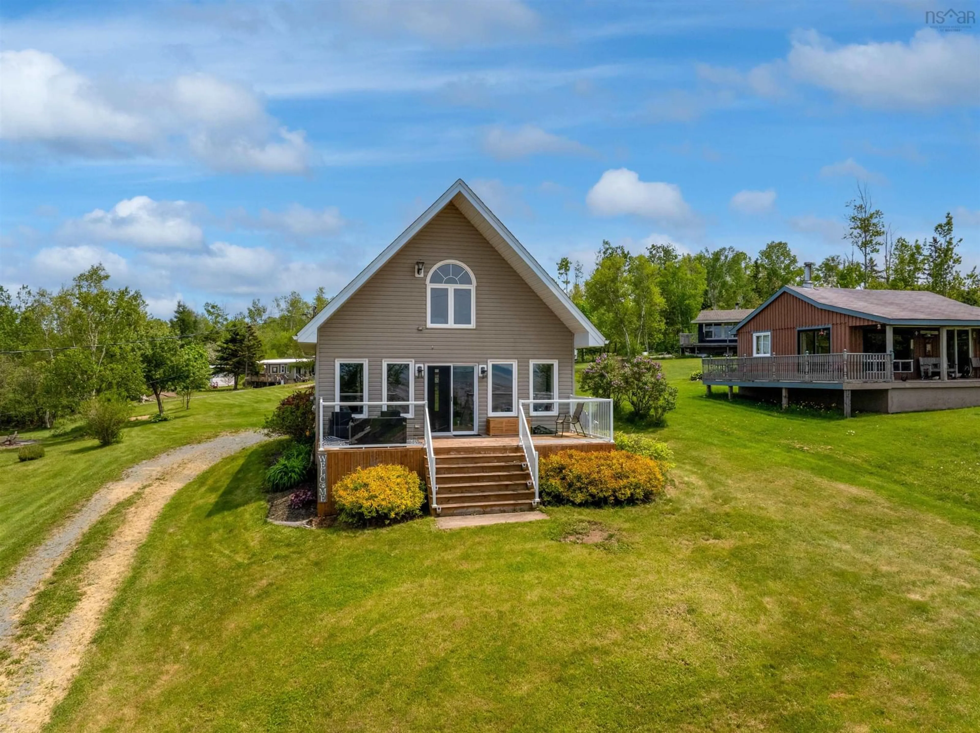 A pic from outside/outdoor area/front of a property/back of a property/a pic from drone, water/lake/river/ocean view for 39 Blomidon View Lane, Bramber Nova Scotia B0N 2A0