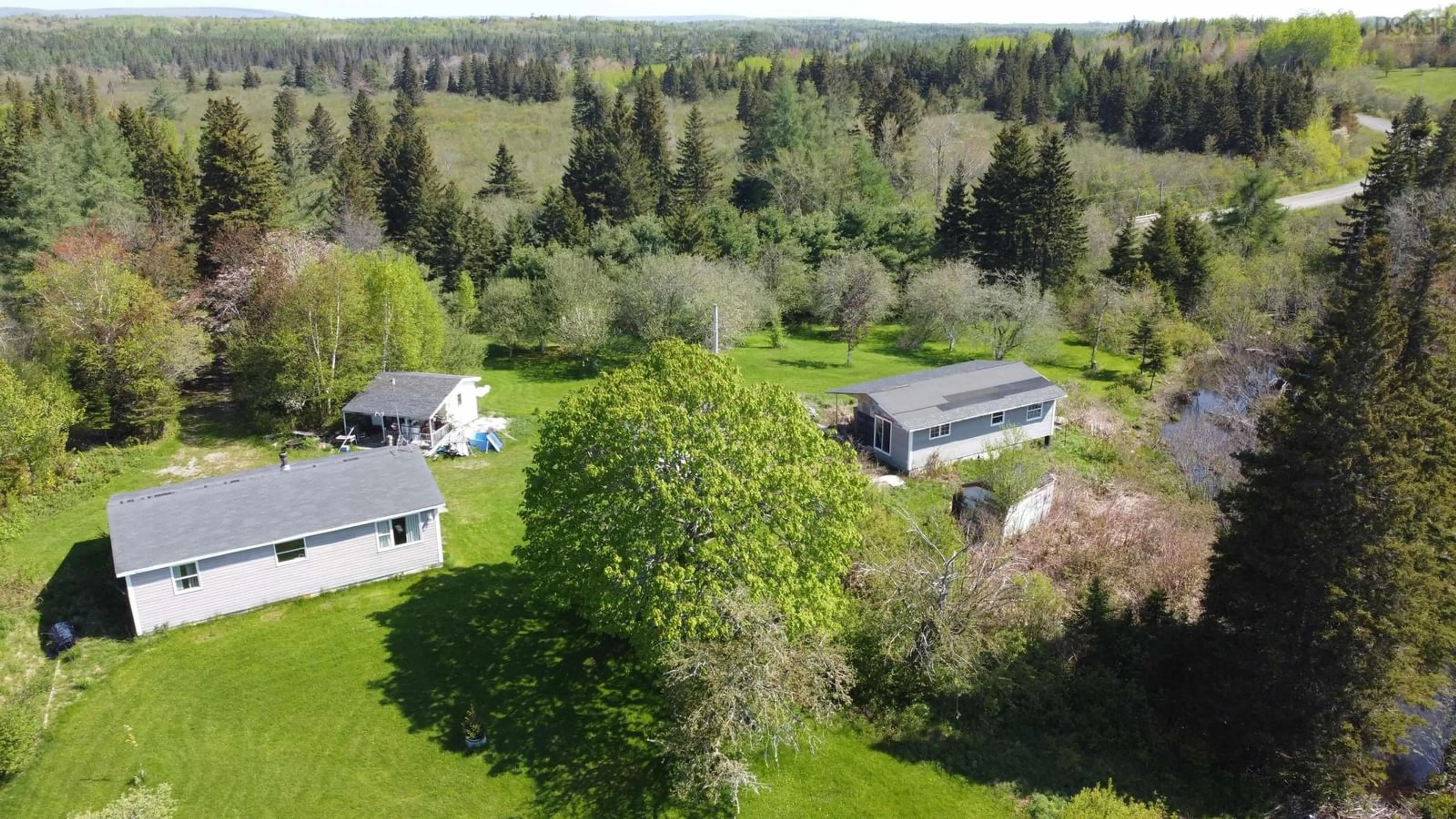 A pic from outside/outdoor area/front of a property/back of a property/a pic from drone, unknown for 1746 South Side River Denys Rd, South Side River Denys Nova Scotia B0E 2Y0