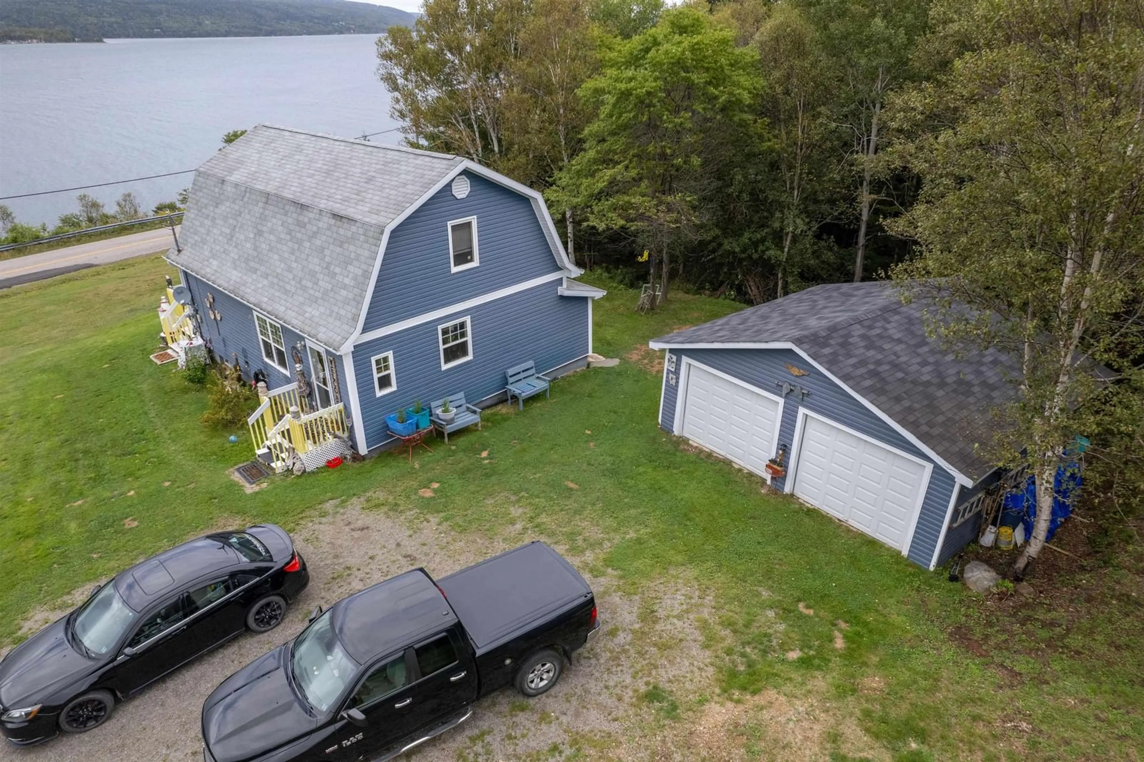 A pic from outside/outdoor area/front of a property/back of a property/a pic from drone, water/lake/river/ocean view for 8872 Kempt Head Rd, Kempt Head Nova Scotia B1X 1R2