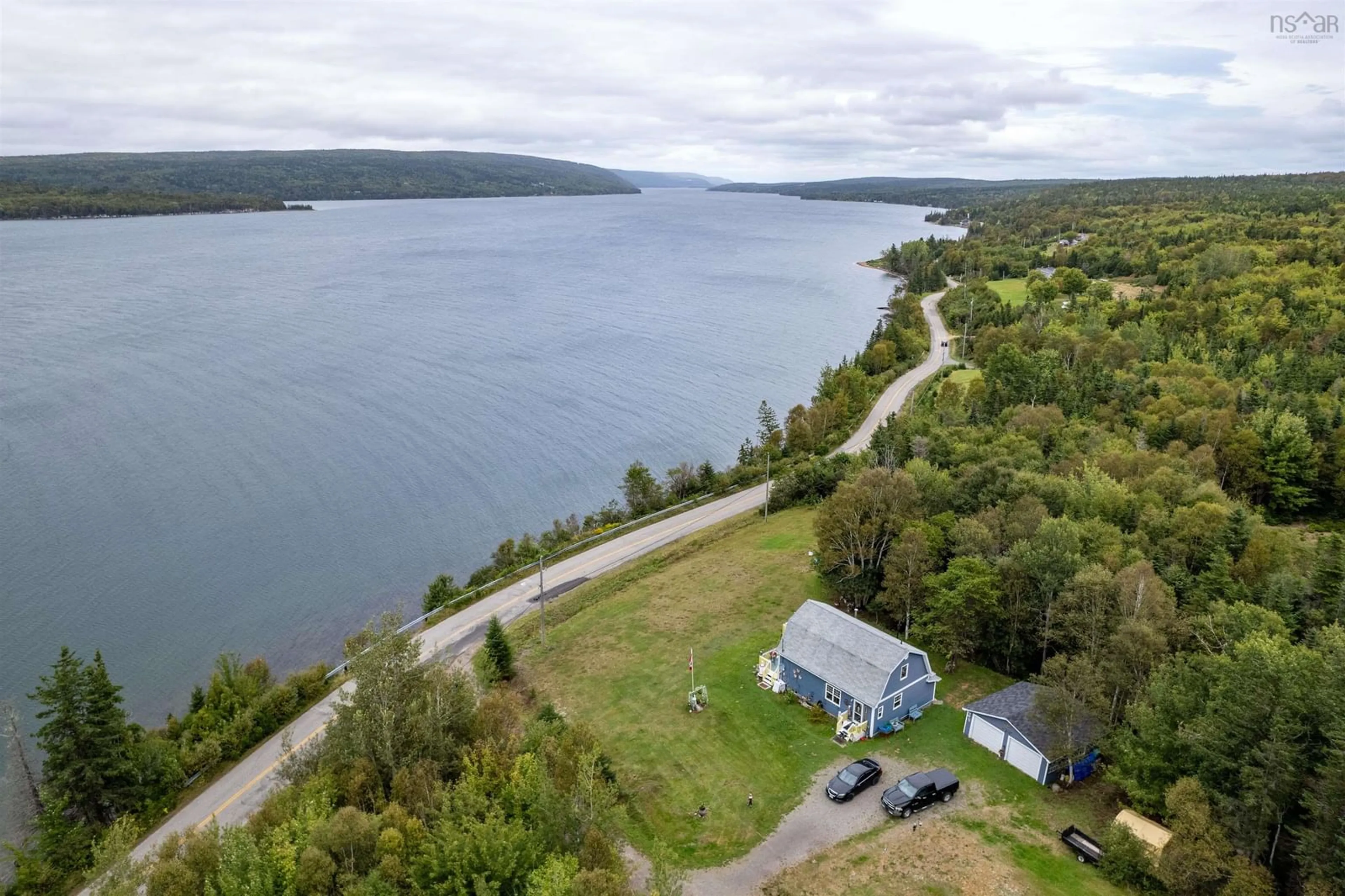 A pic from outside/outdoor area/front of a property/back of a property/a pic from drone, water/lake/river/ocean view for 8872 Kempt Head Rd, Kempt Head Nova Scotia B1X 1R2