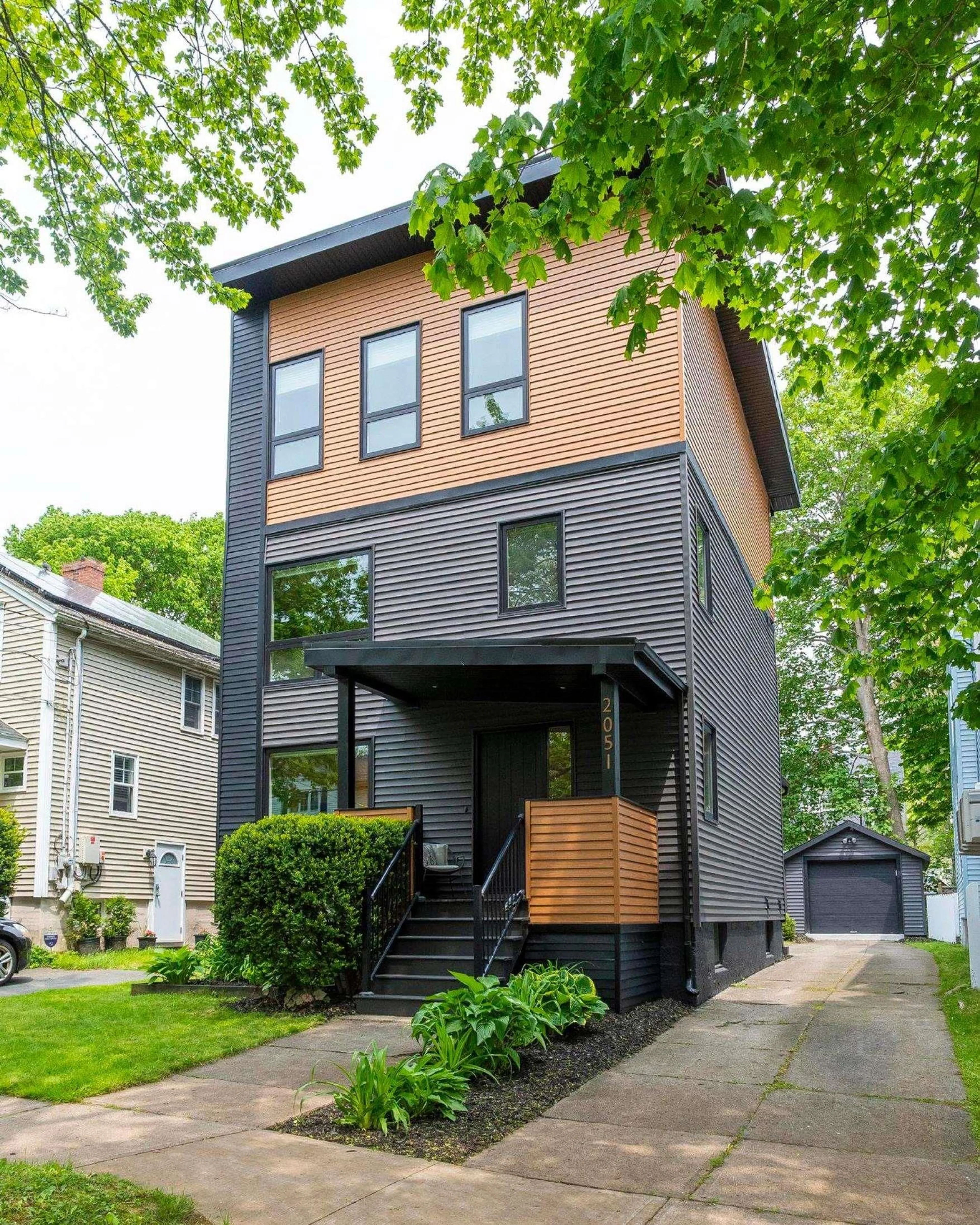 Home with vinyl exterior material, street for 2051 Poplar St, Halifax Nova Scotia B3L 2Y6