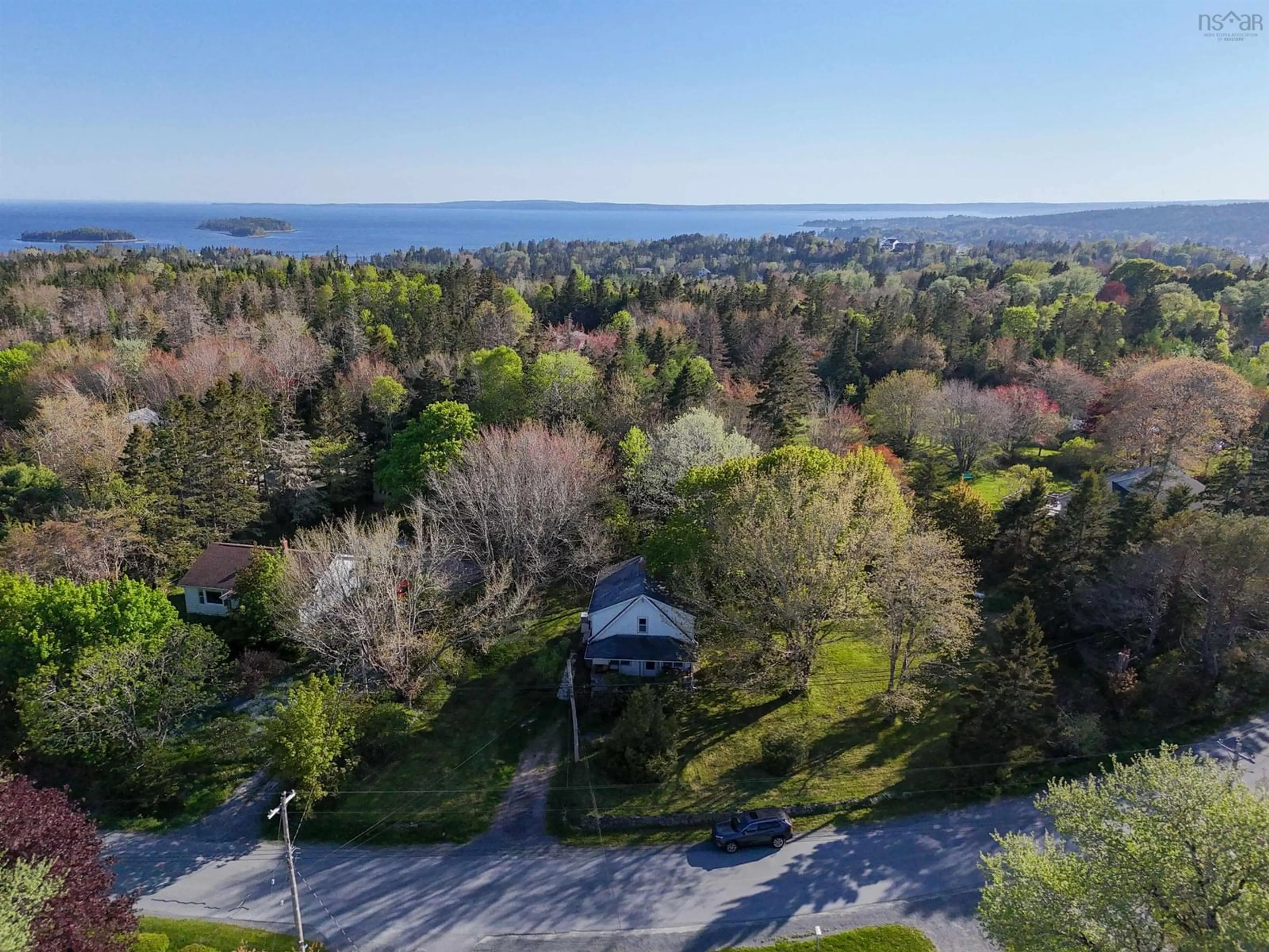 A pic from outside/outdoor area/front of a property/back of a property/a pic from drone, water/lake/river/ocean view for 210 Island View Dr, Boutiliers Point Nova Scotia B3Z 1S3