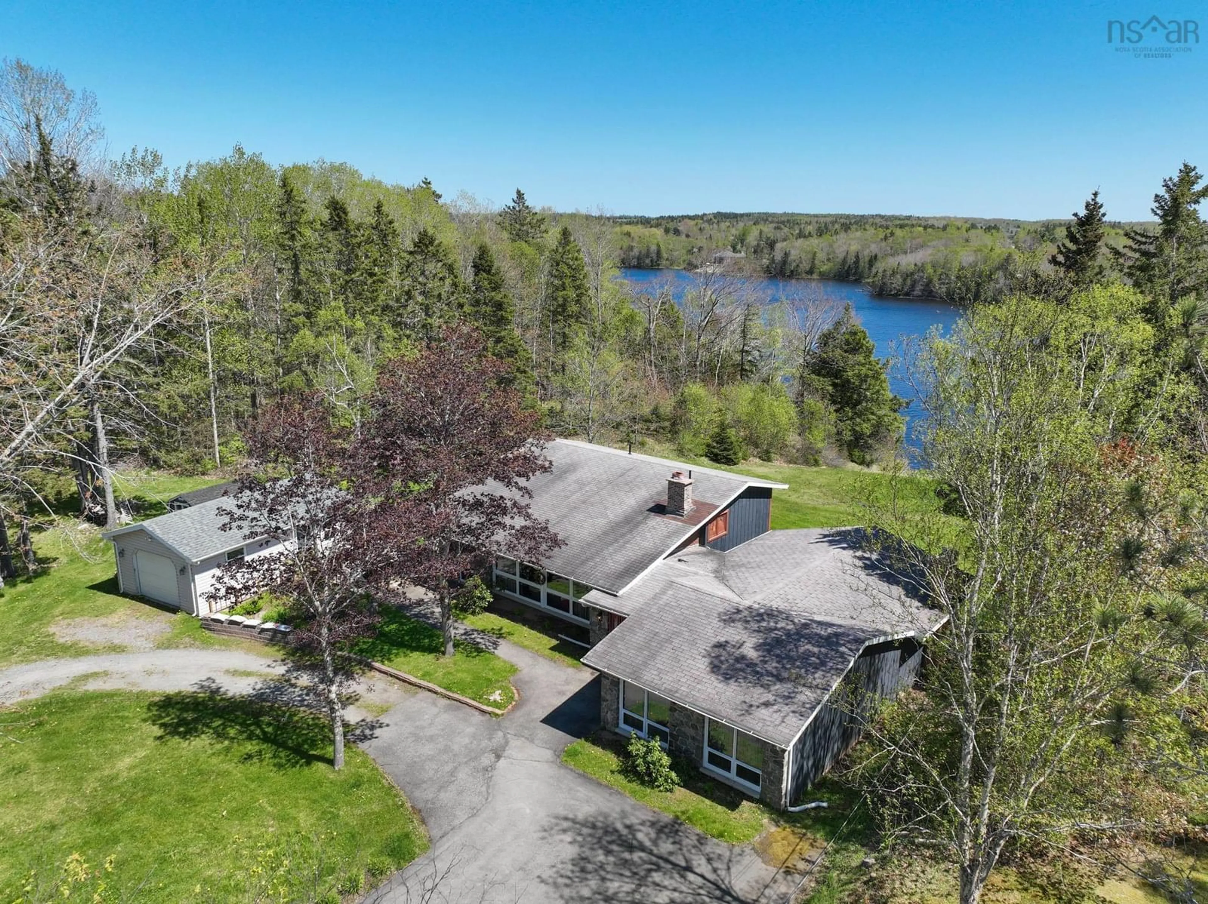 A pic from outside/outdoor area/front of a property/back of a property/a pic from drone, water/lake/river/ocean view for 63 Poushay Dr, Coxheath Nova Scotia B1L 1B4