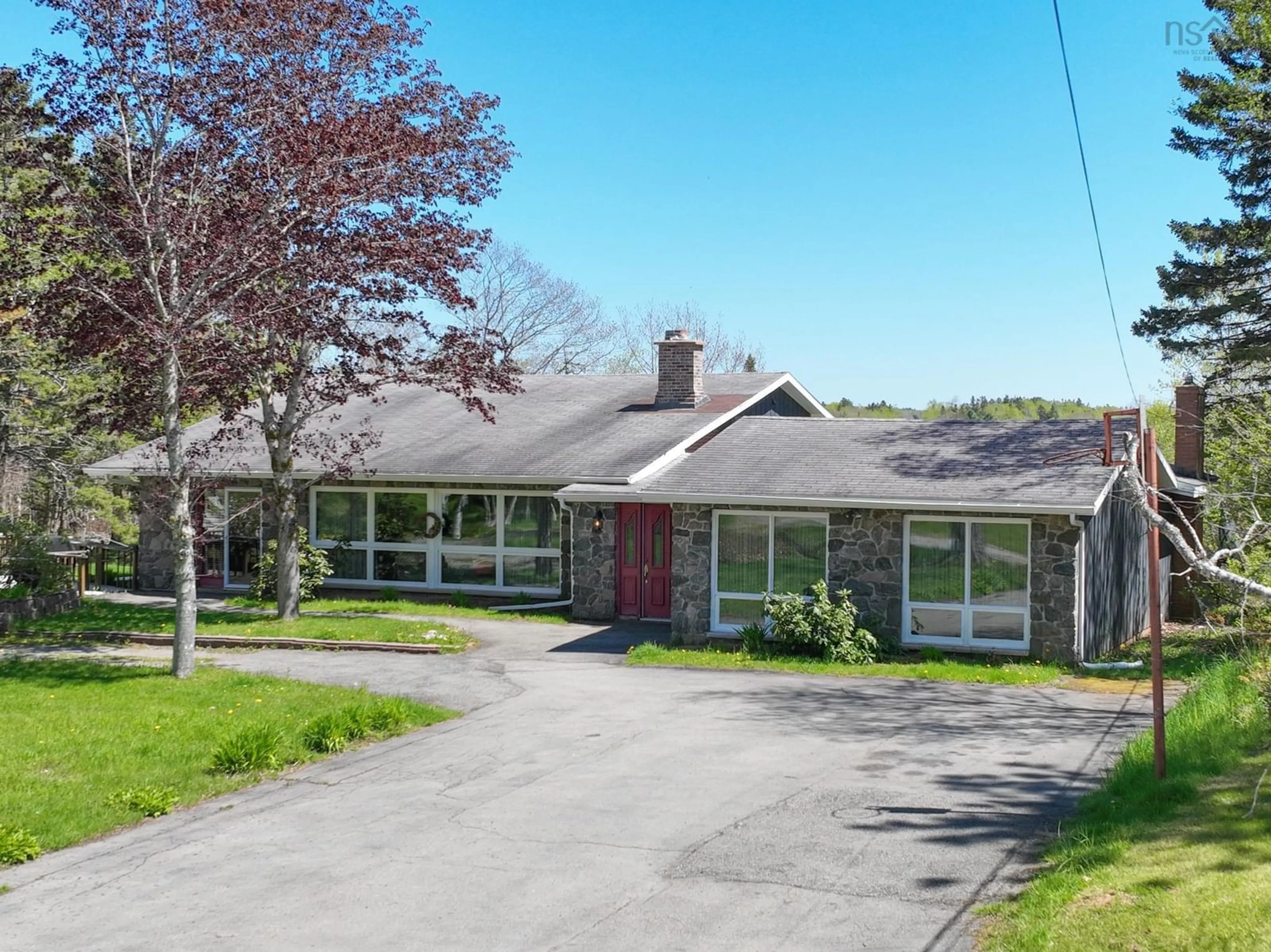 A pic from outside/outdoor area/front of a property/back of a property/a pic from drone, street for 63 Poushay Dr, Coxheath Nova Scotia B1L 1B4