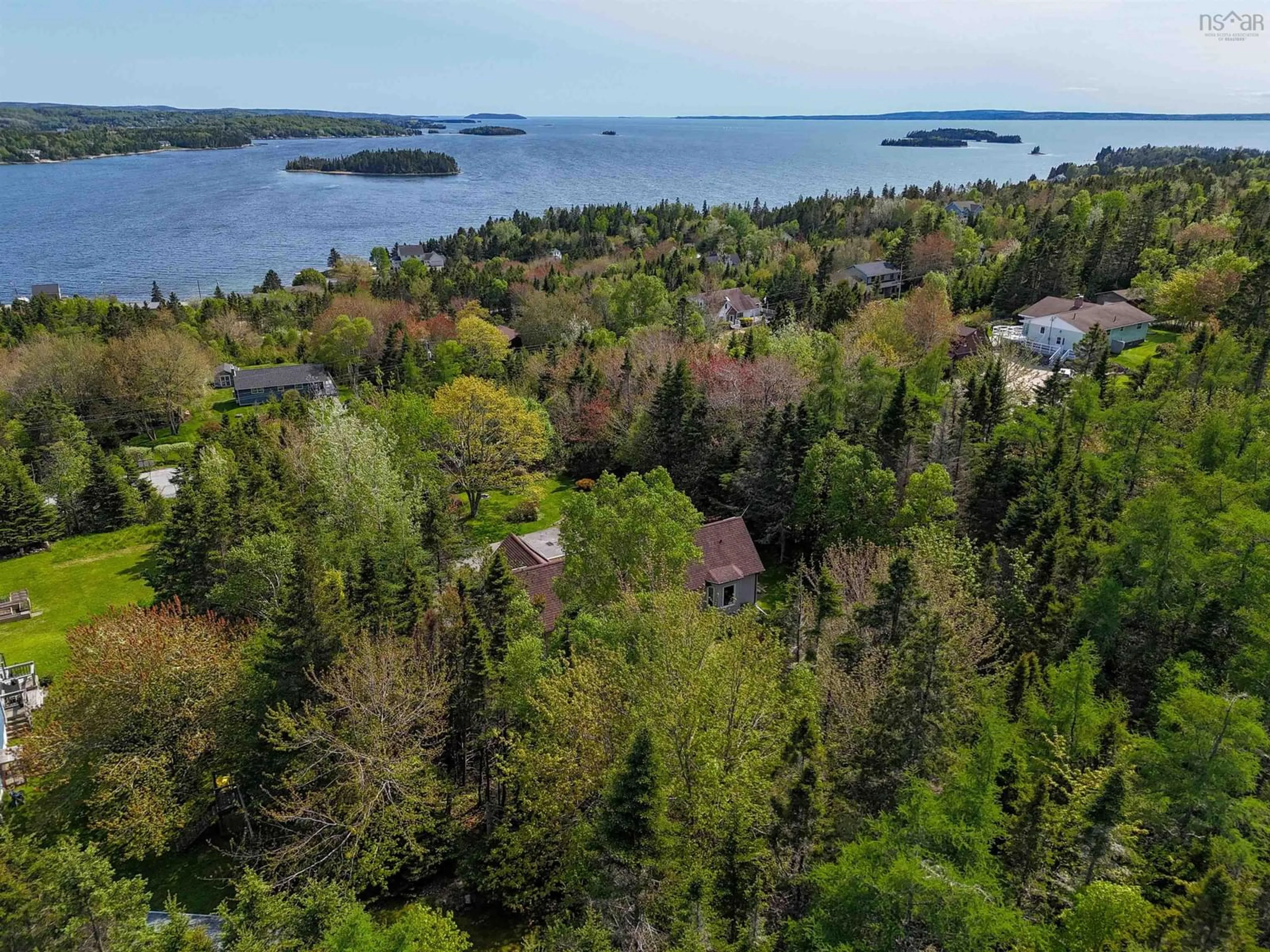 A pic from outside/outdoor area/front of a property/back of a property/a pic from drone, water/lake/river/ocean view for 252 Hillside Dr, Boutiliers Point Nova Scotia B3Z 1W8