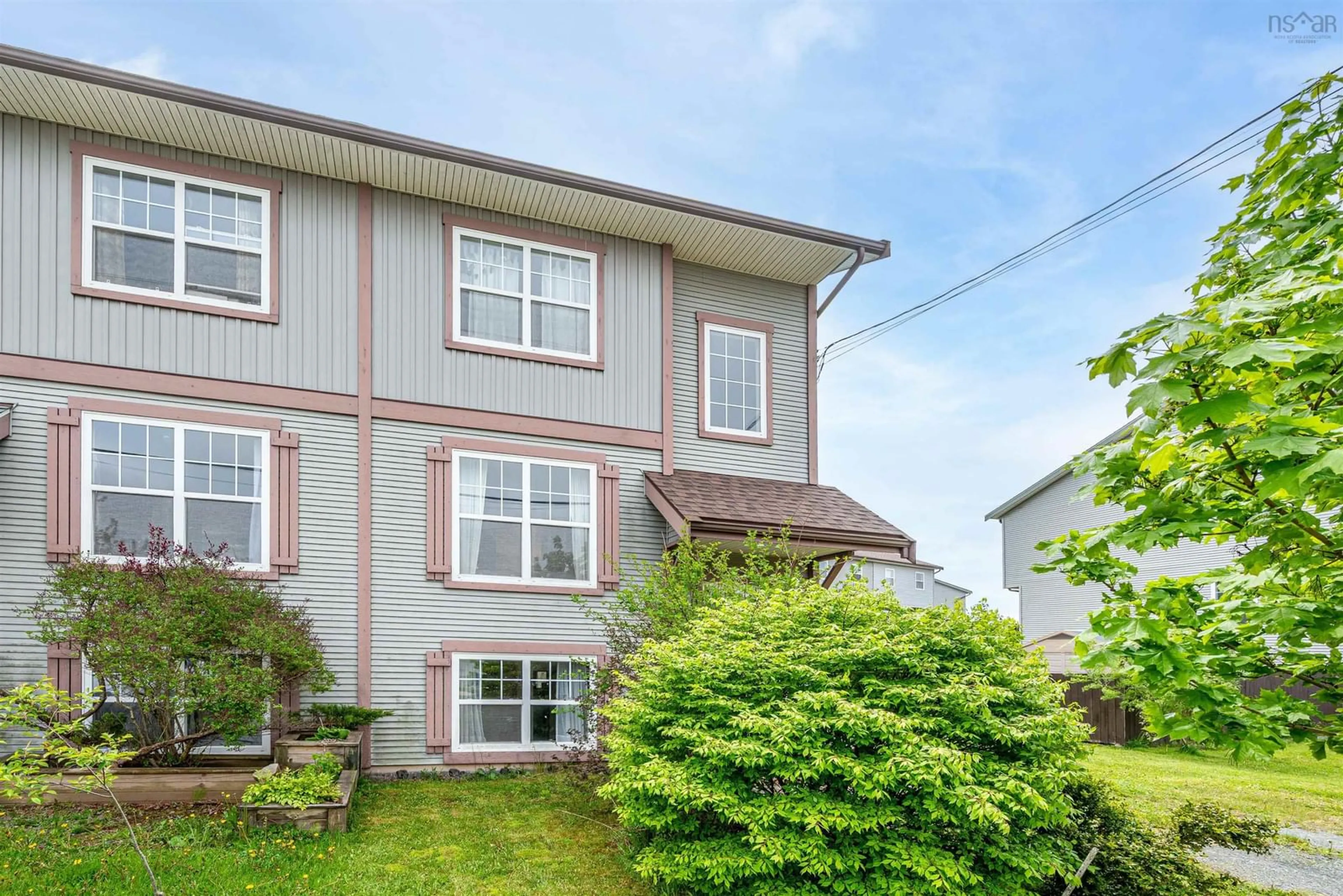 A pic from outside/outdoor area/front of a property/back of a property/a pic from drone, unknown for 455 Cow Bay Rd, Eastern Passage Nova Scotia B3G 1J4