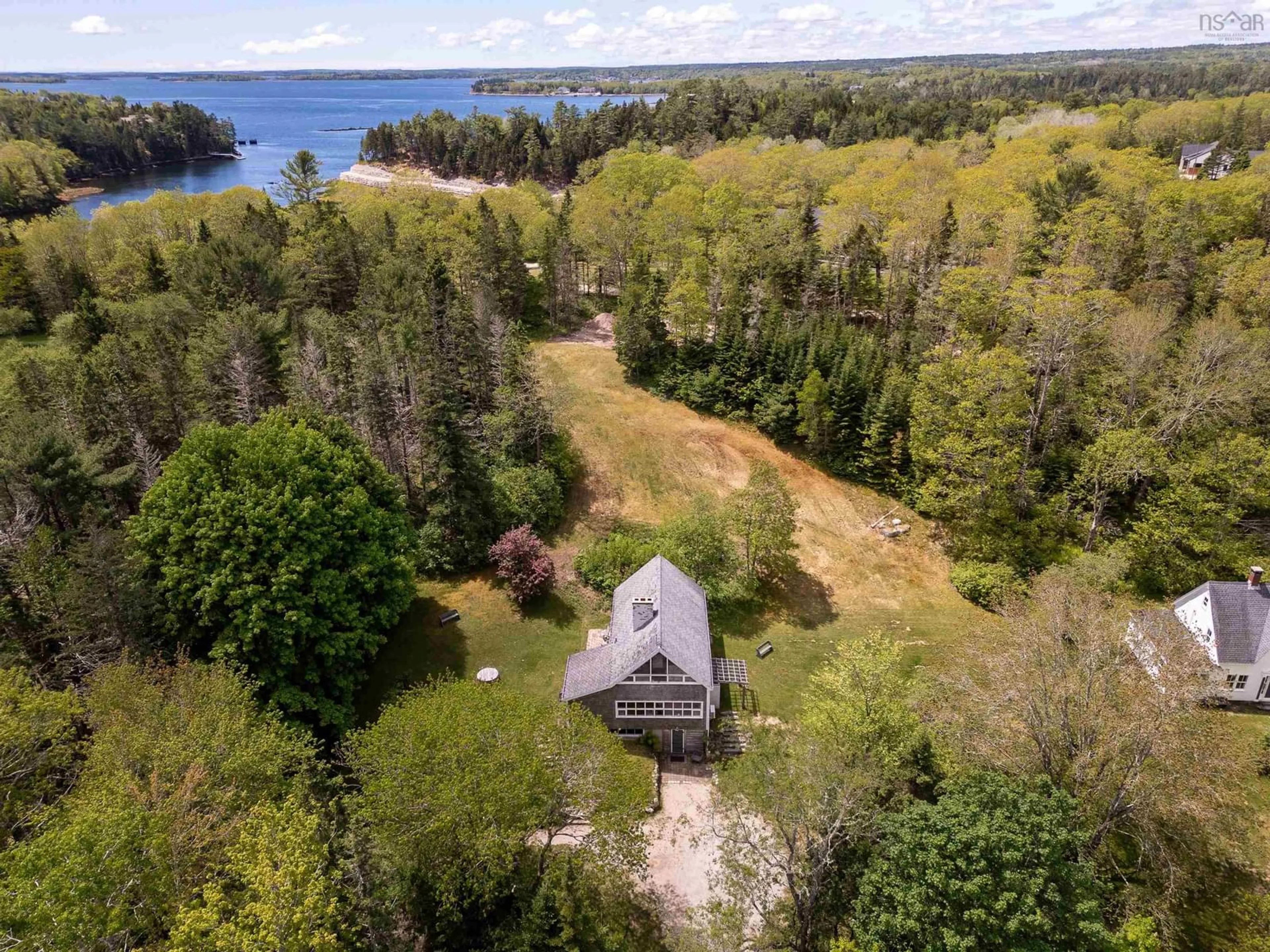 A pic from outside/outdoor area/front of a property/back of a property/a pic from drone, water/lake/river/ocean view for 36 Latimer Lane, Chester Basin Nova Scotia B0J 1K0