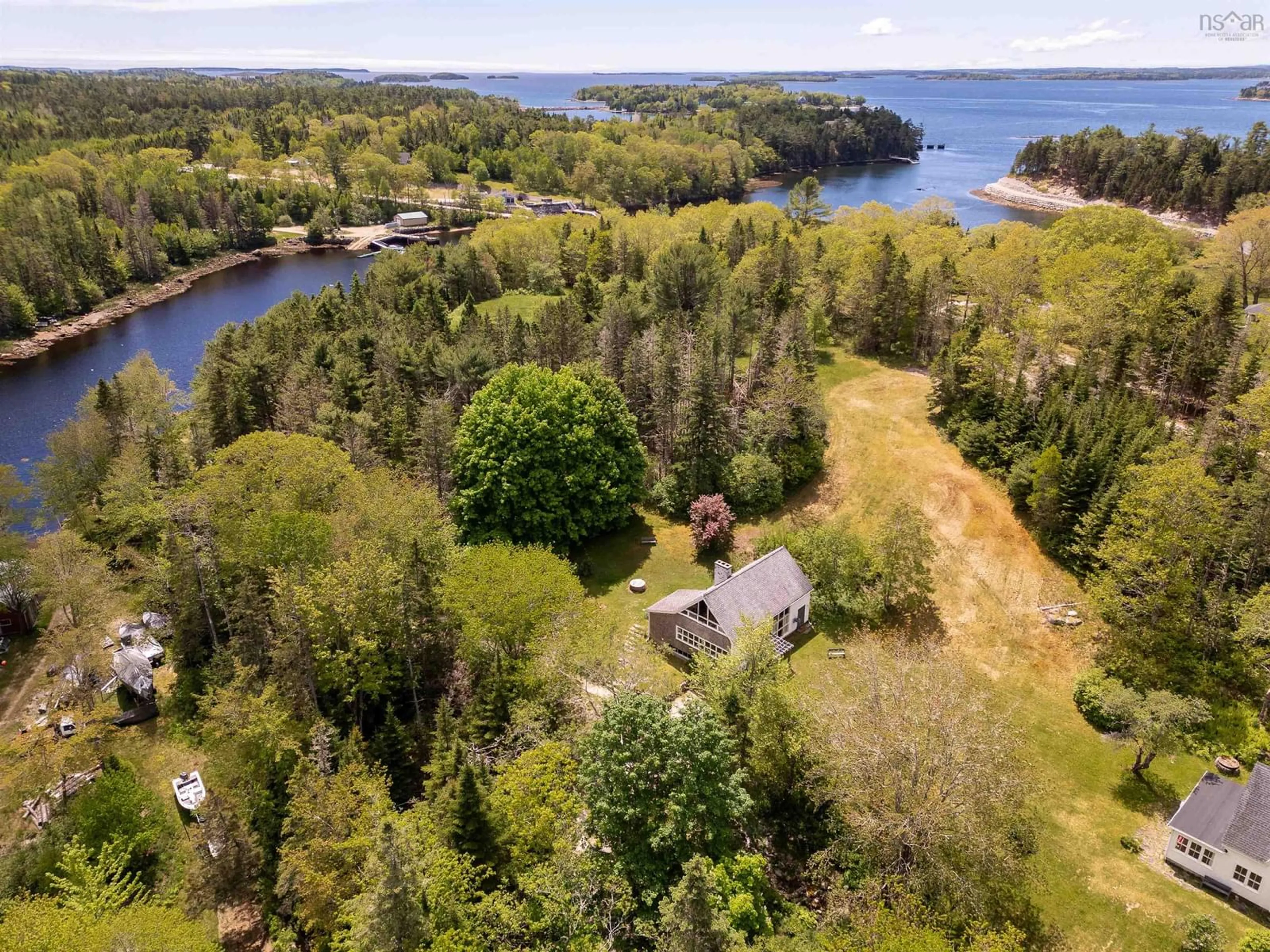 A pic from outside/outdoor area/front of a property/back of a property/a pic from drone, water/lake/river/ocean view for 36 Latimer Lane, Chester Basin Nova Scotia B0J 1K0