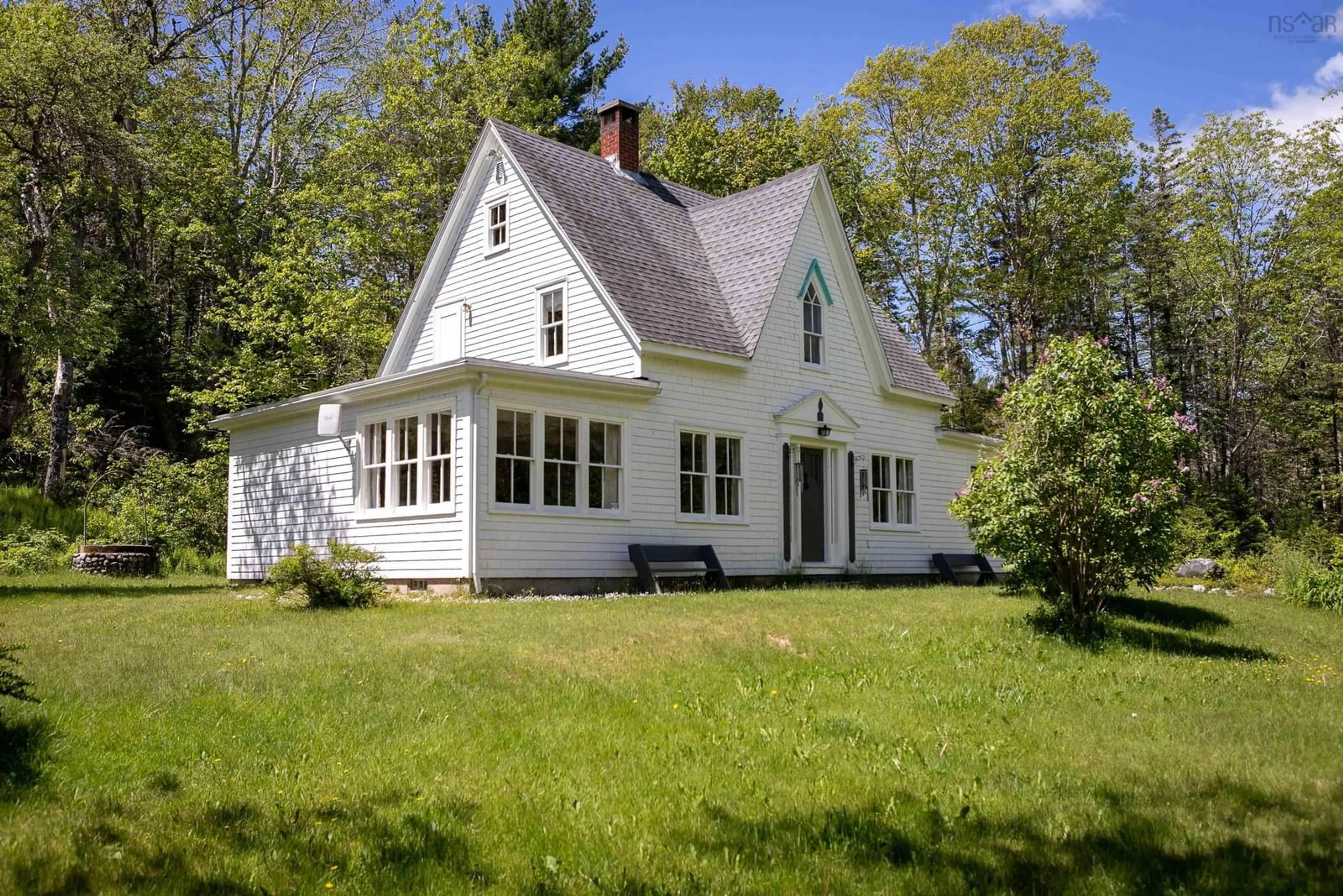 Home with vinyl exterior material, street for 16 Latimer Lane, Chester Basin Nova Scotia B0J 1K0