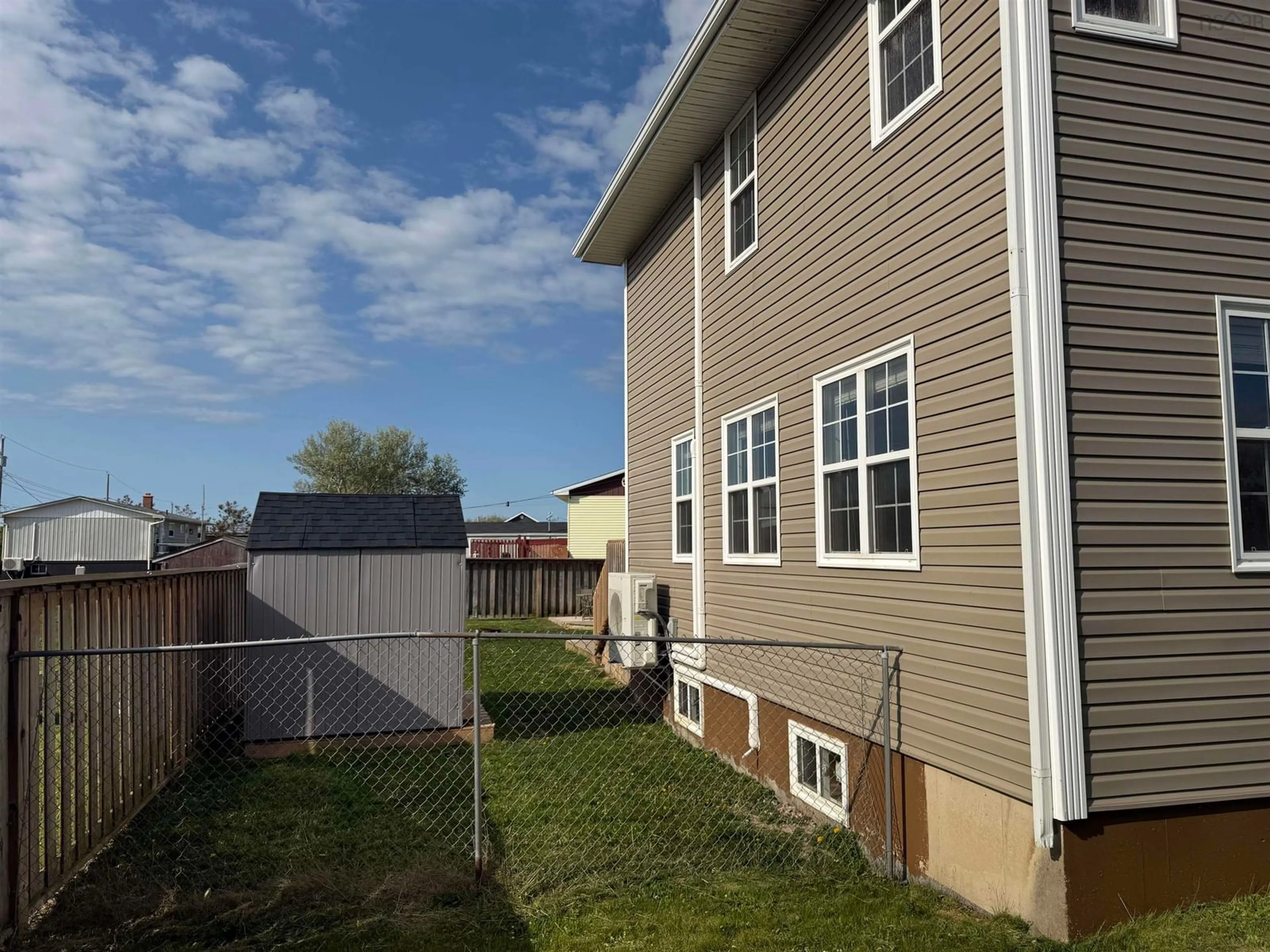 Home with vinyl exterior material, street for 9 Sampson Lane, New Victoria Nova Scotia B1H 2T3