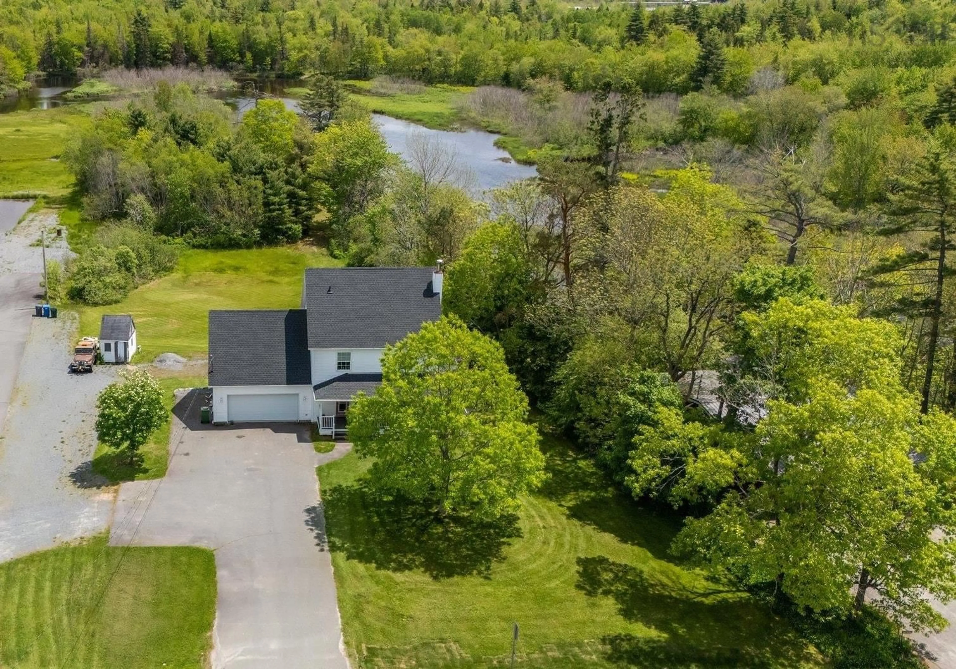 A pic from outside/outdoor area/front of a property/back of a property/a pic from drone, water/lake/river/ocean view for 109 Highway 2, Enfield Nova Scotia B2T 1C8