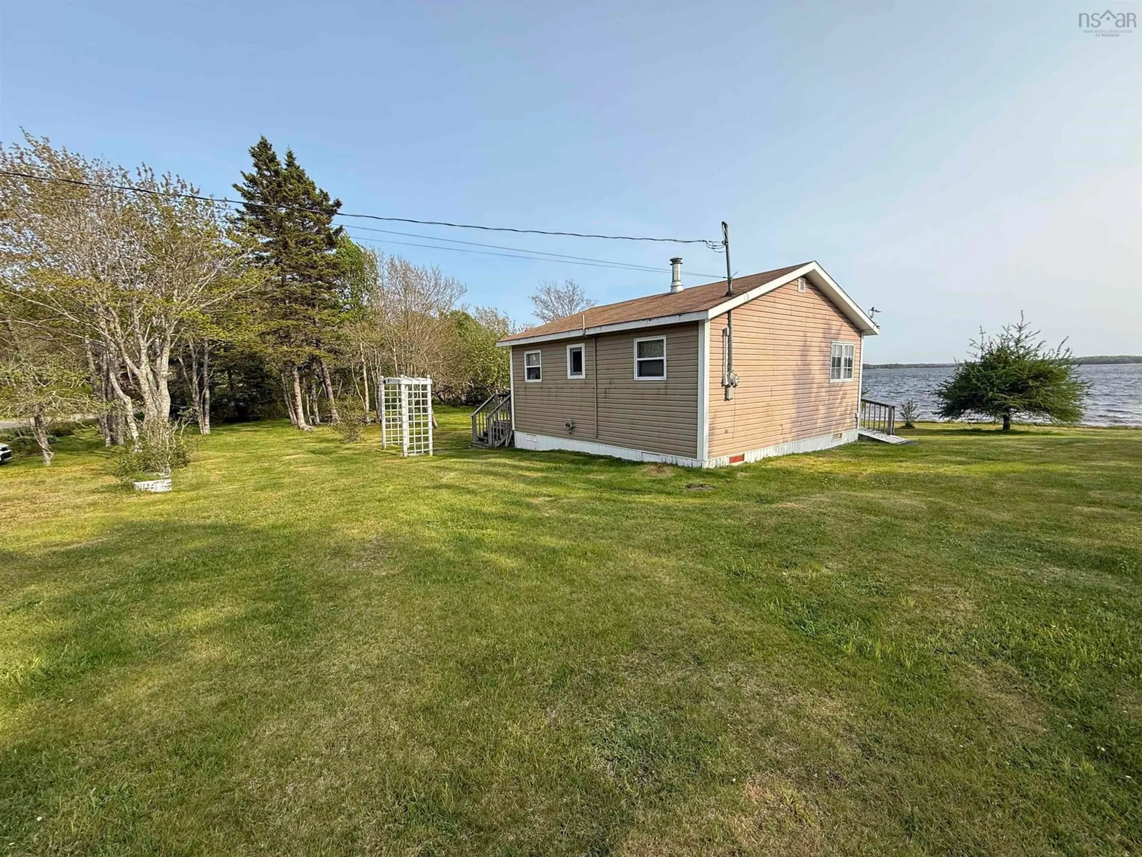 A pic from outside/outdoor area/front of a property/back of a property/a pic from drone, water/lake/river/ocean view for 305 Macvicar Rd, Enon Nova Scotia B1J 1W4
