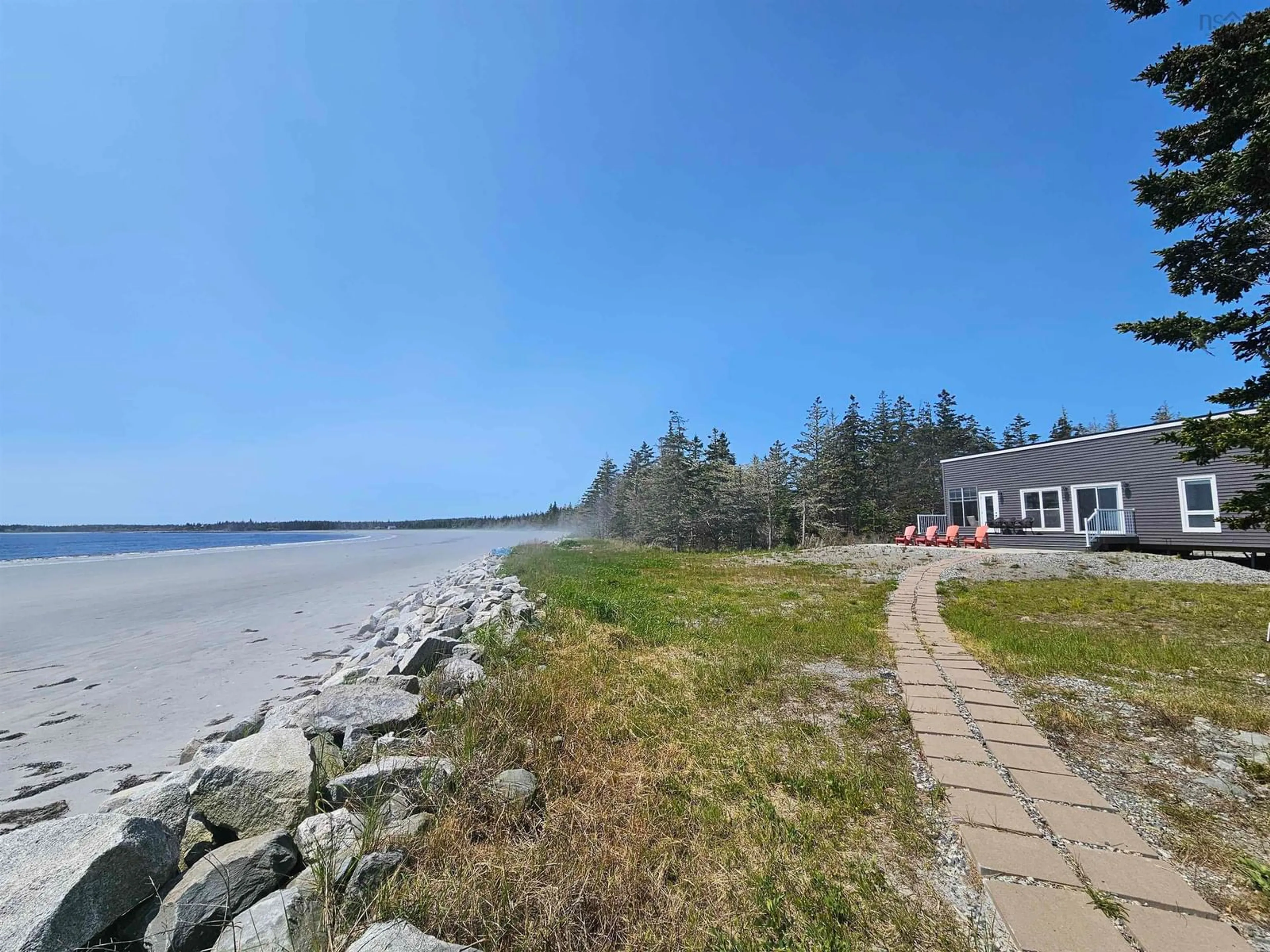 A pic from outside/outdoor area/front of a property/back of a property/a pic from drone, water/lake/river/ocean view for 70 Seaside Dr, Louis Head Nova Scotia B0T 1W0