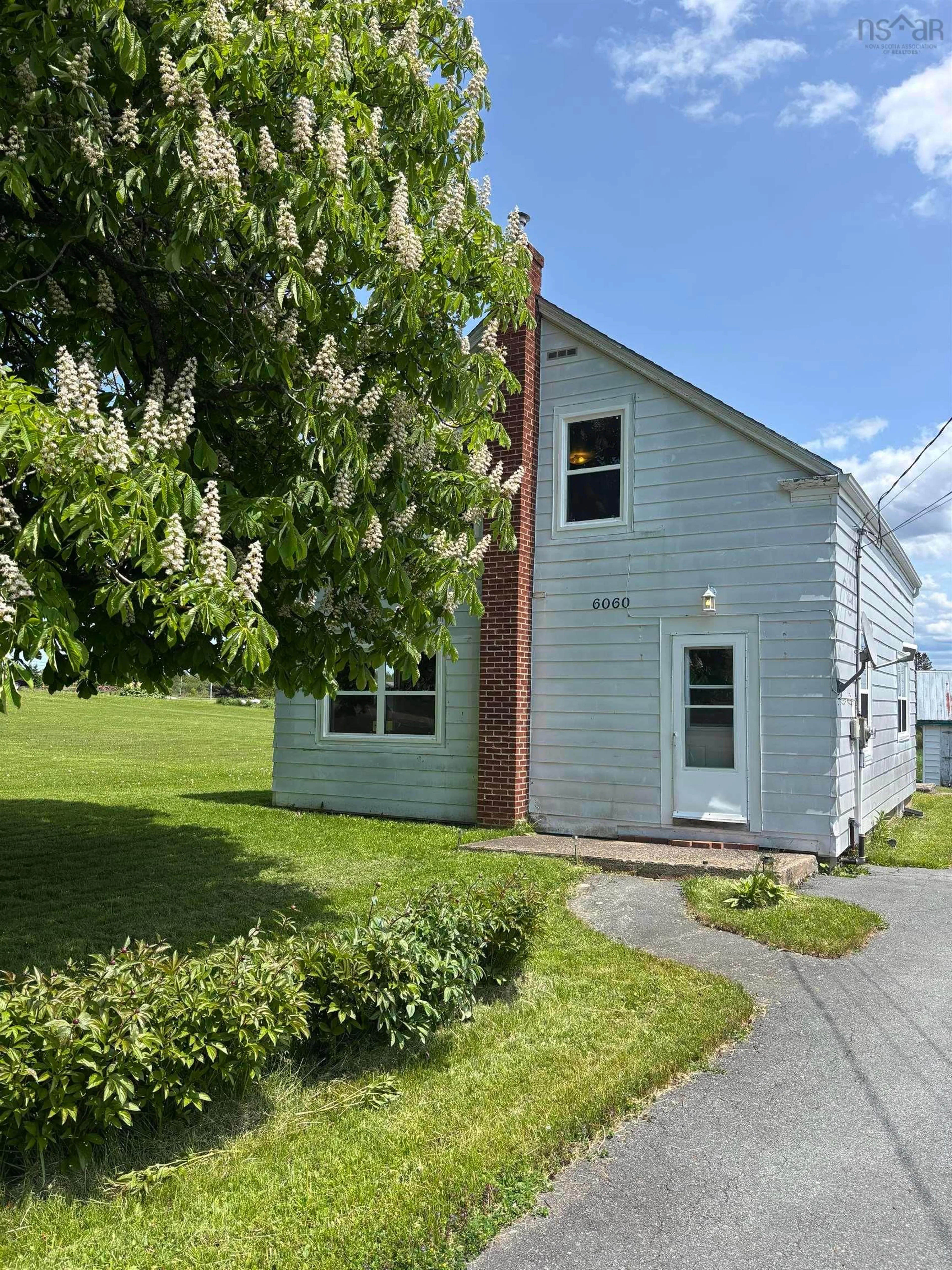 Home with vinyl exterior material, street for 6060 Kempt Shore,    215 Hwy, Kempt Shore Nova Scotia B0N 2A0