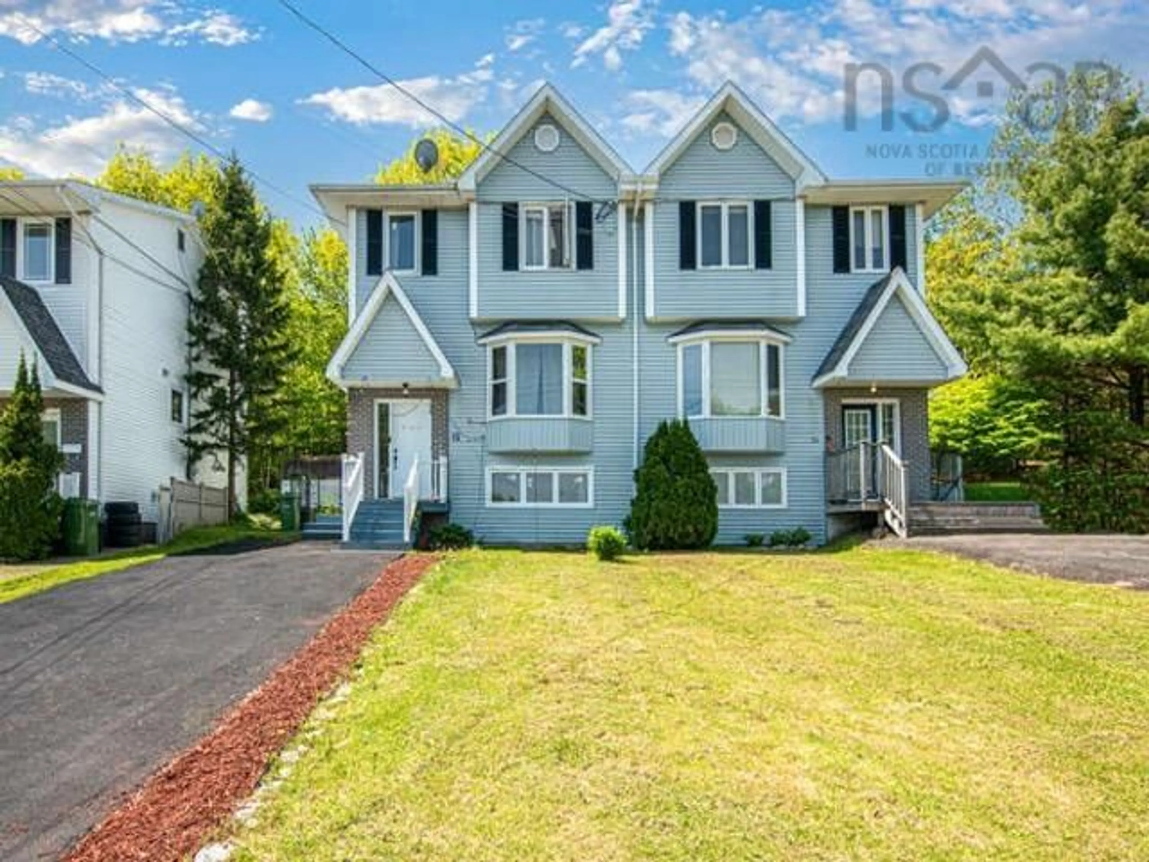 Home with vinyl exterior material, street for 12 Fir Tree Lane, Halifax Regional Municipality Nova Scotia B3T 1J9
