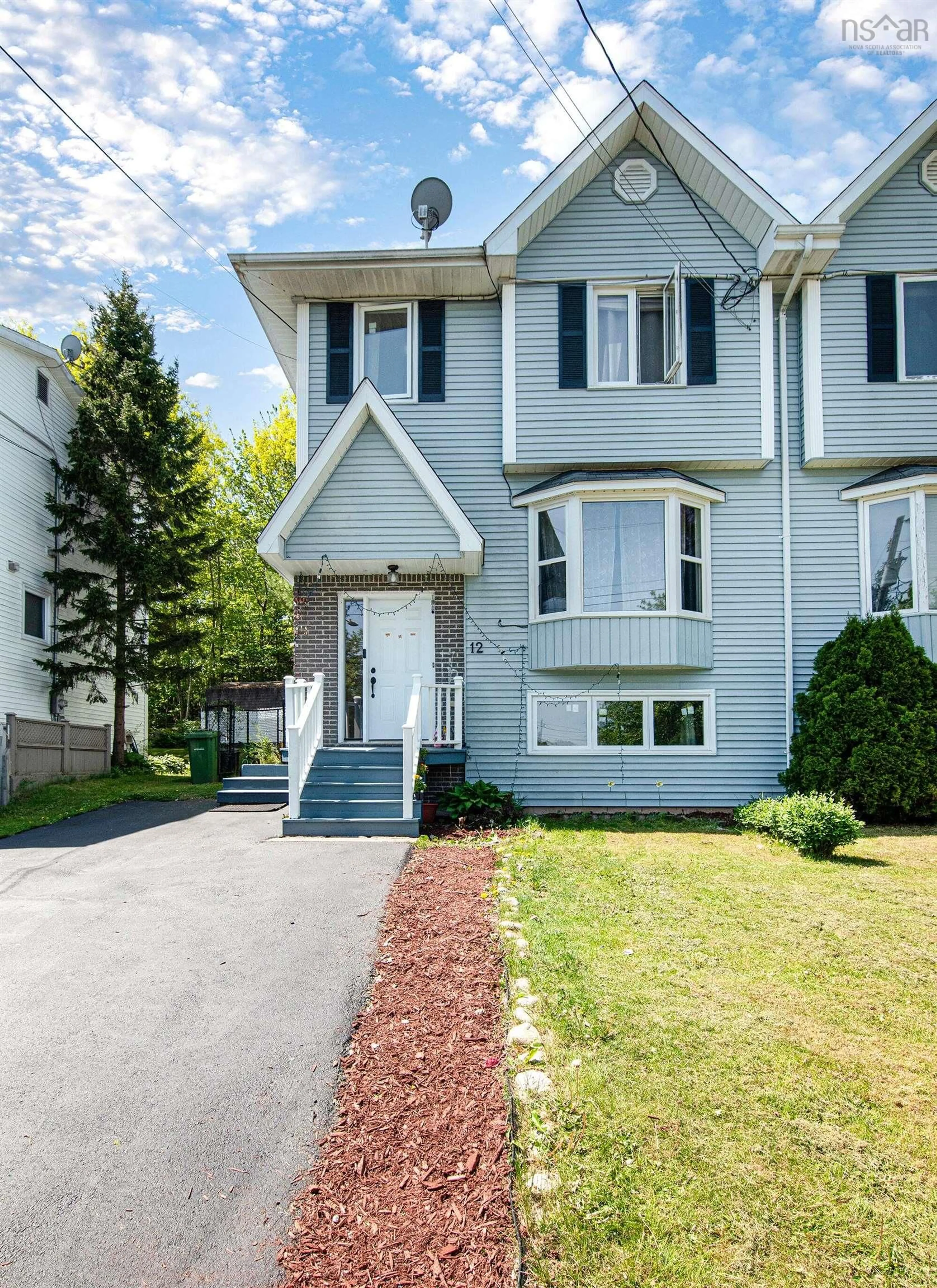 Home with vinyl exterior material, street for 12 Fir Tree Lane, Halifax Regional Municipality Nova Scotia B3T 1J9