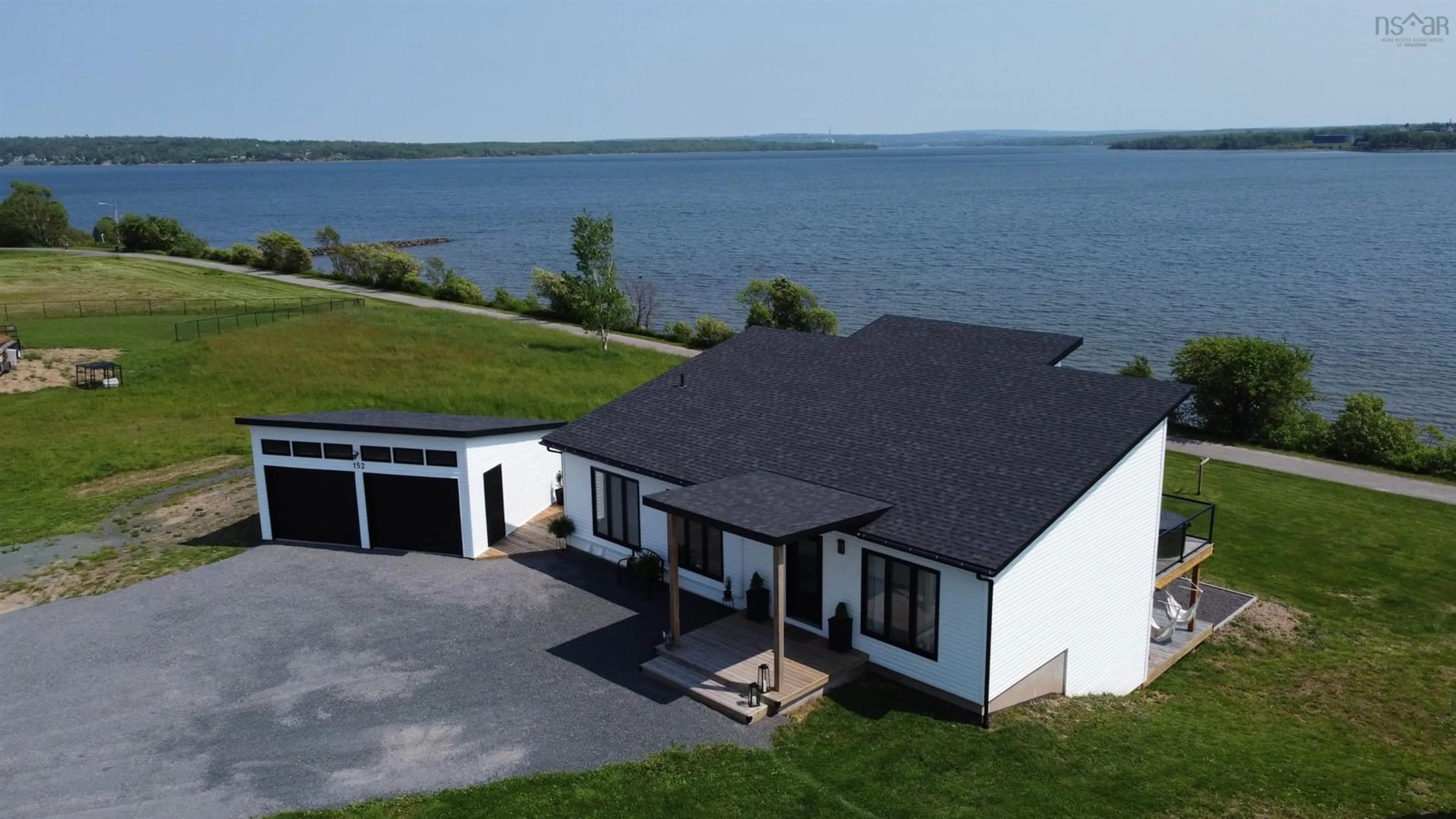 A pic from outside/outdoor area/front of a property/back of a property/a pic from drone, water/lake/river/ocean view for 152 Harbour Crossing Dr, Pictou Nova Scotia B0K 1H0