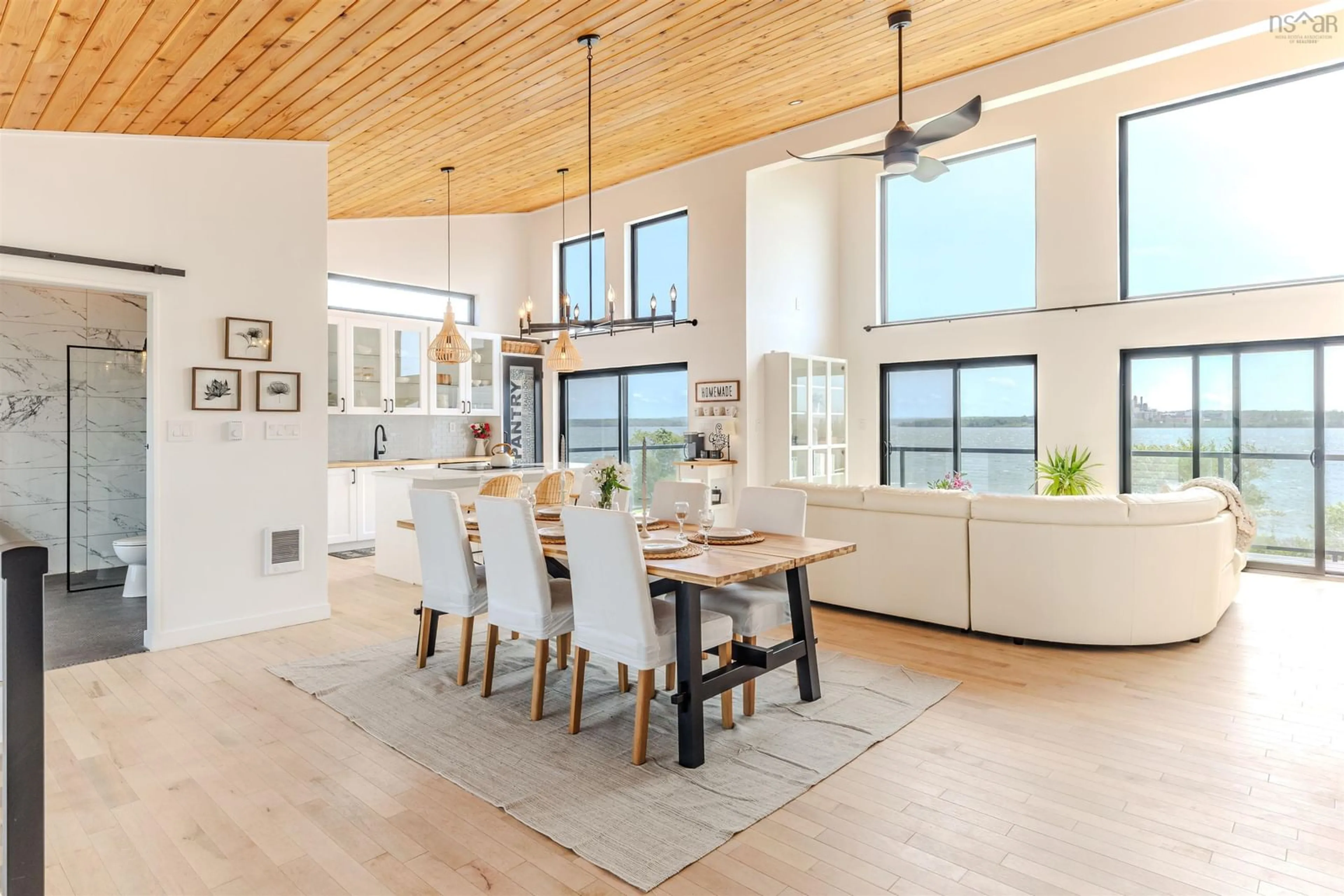 Open concept kitchen, wood/laminate floor for 152 Harbour Crossing Dr, Pictou Nova Scotia B0K 1H0