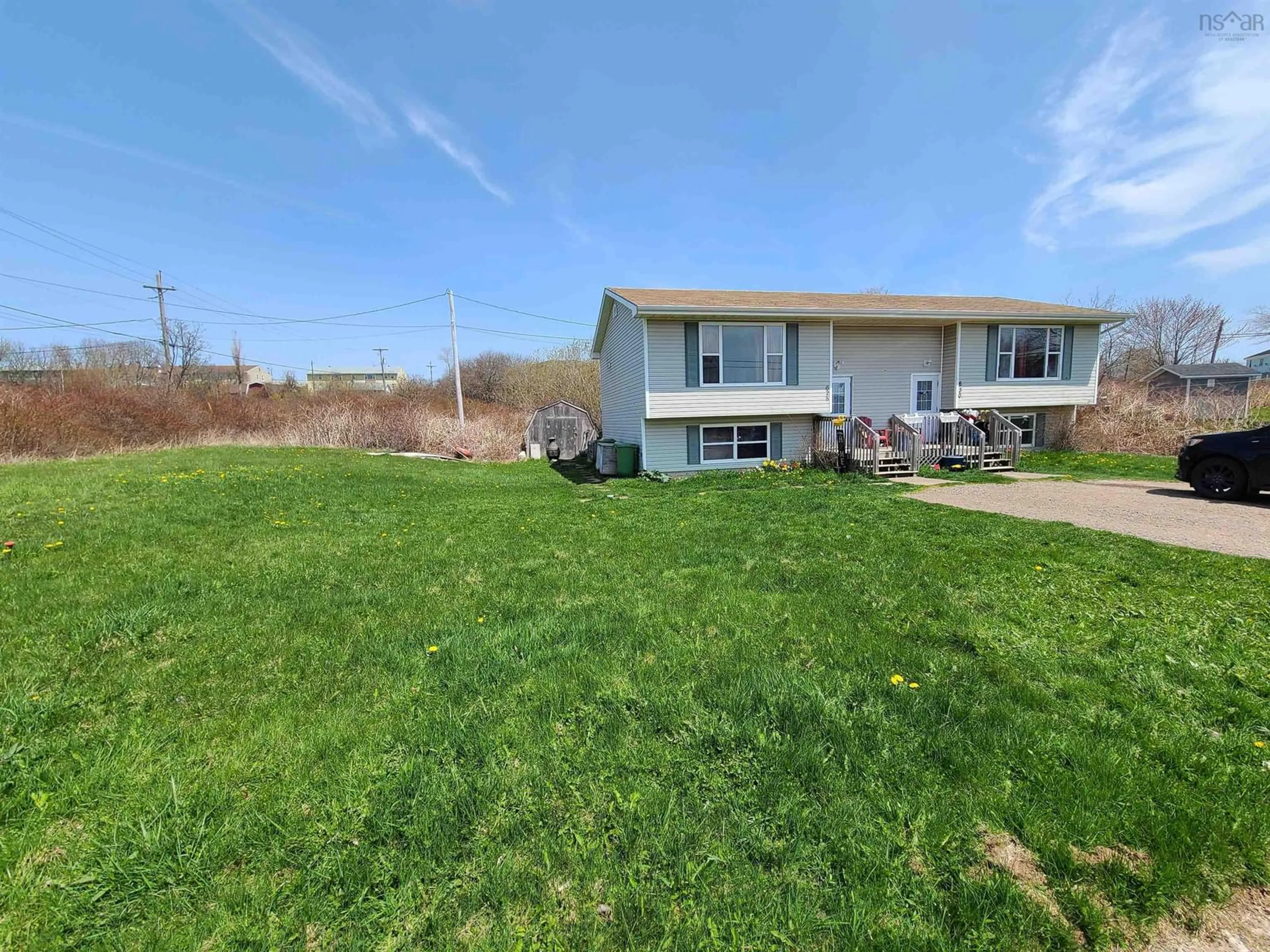 A pic from outside/outdoor area/front of a property/back of a property/a pic from drone, water/lake/river/ocean view for 628-630 Bernard St, Port Hawkesbury Nova Scotia B9A 3G5