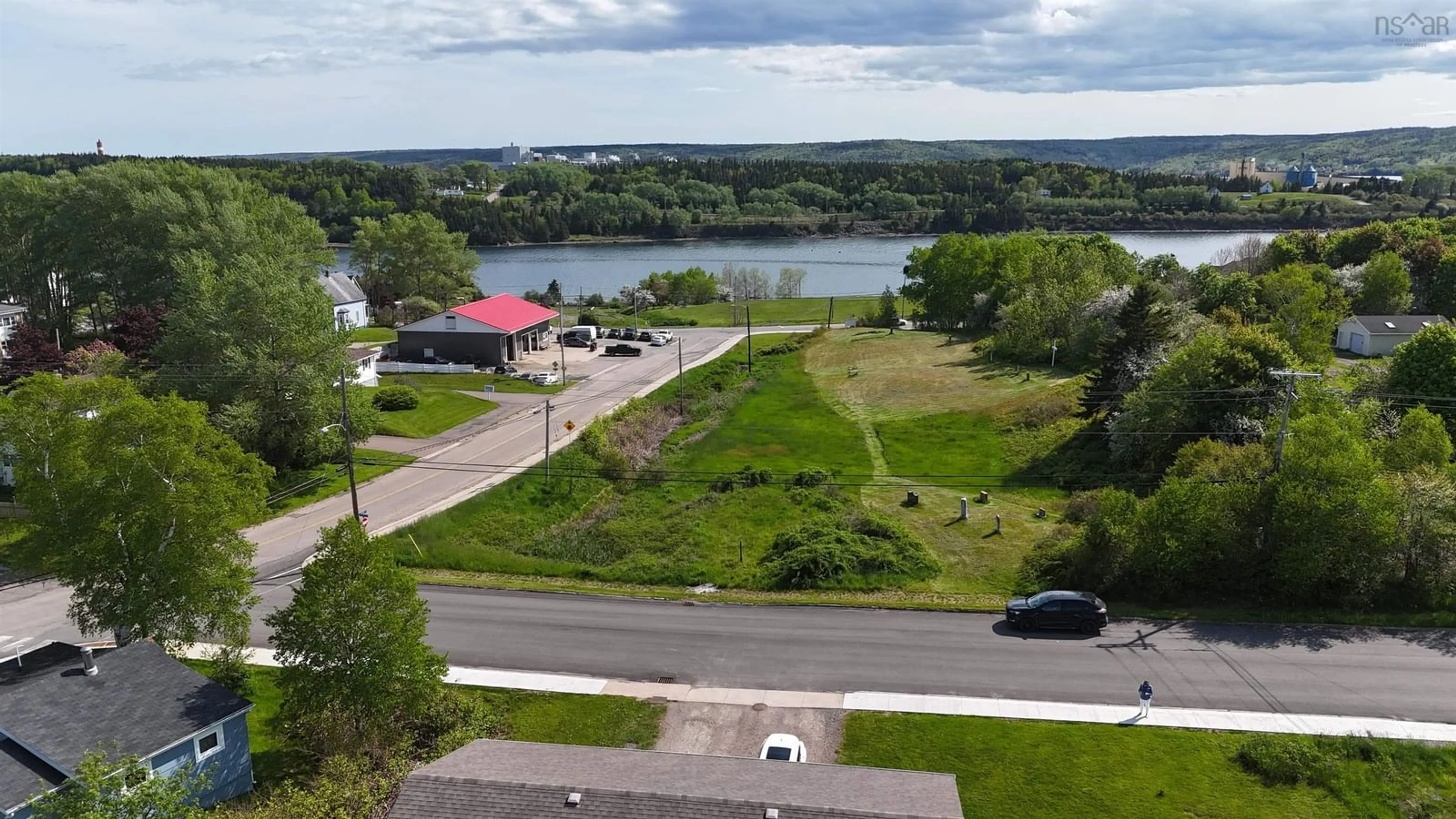 A pic from outside/outdoor area/front of a property/back of a property/a pic from drone, water/lake/river/ocean view for 628-630 Bernard St, Port Hawkesbury Nova Scotia B9A 3G5