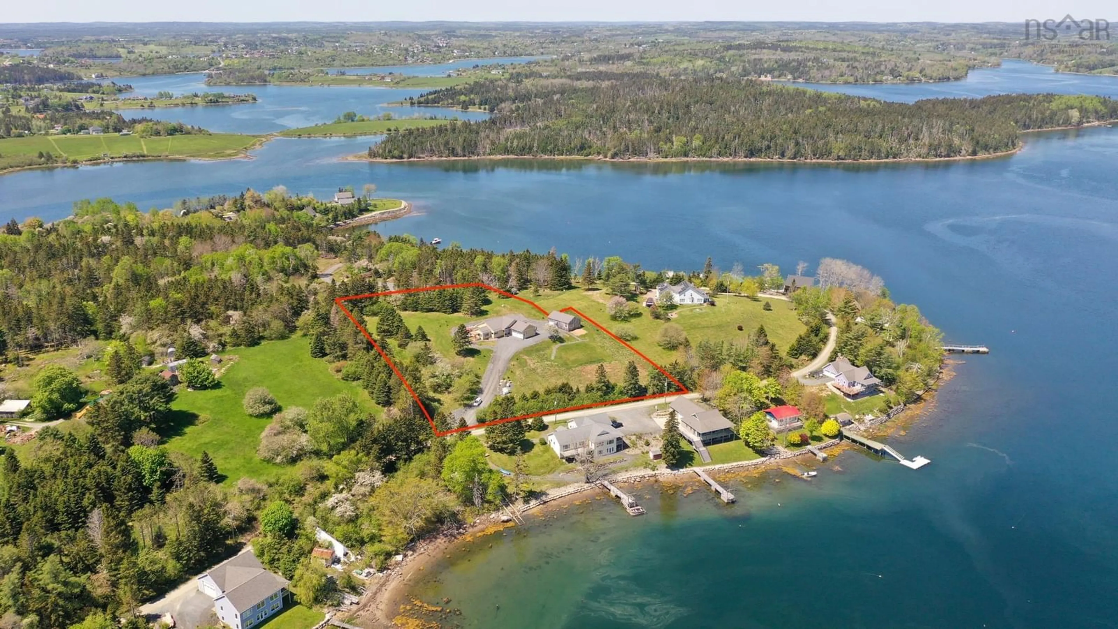 A pic from outside/outdoor area/front of a property/back of a property/a pic from drone, water/lake/river/ocean view for 207 Hebb Point Rd, Heckmans Island Nova Scotia B0J 2C0