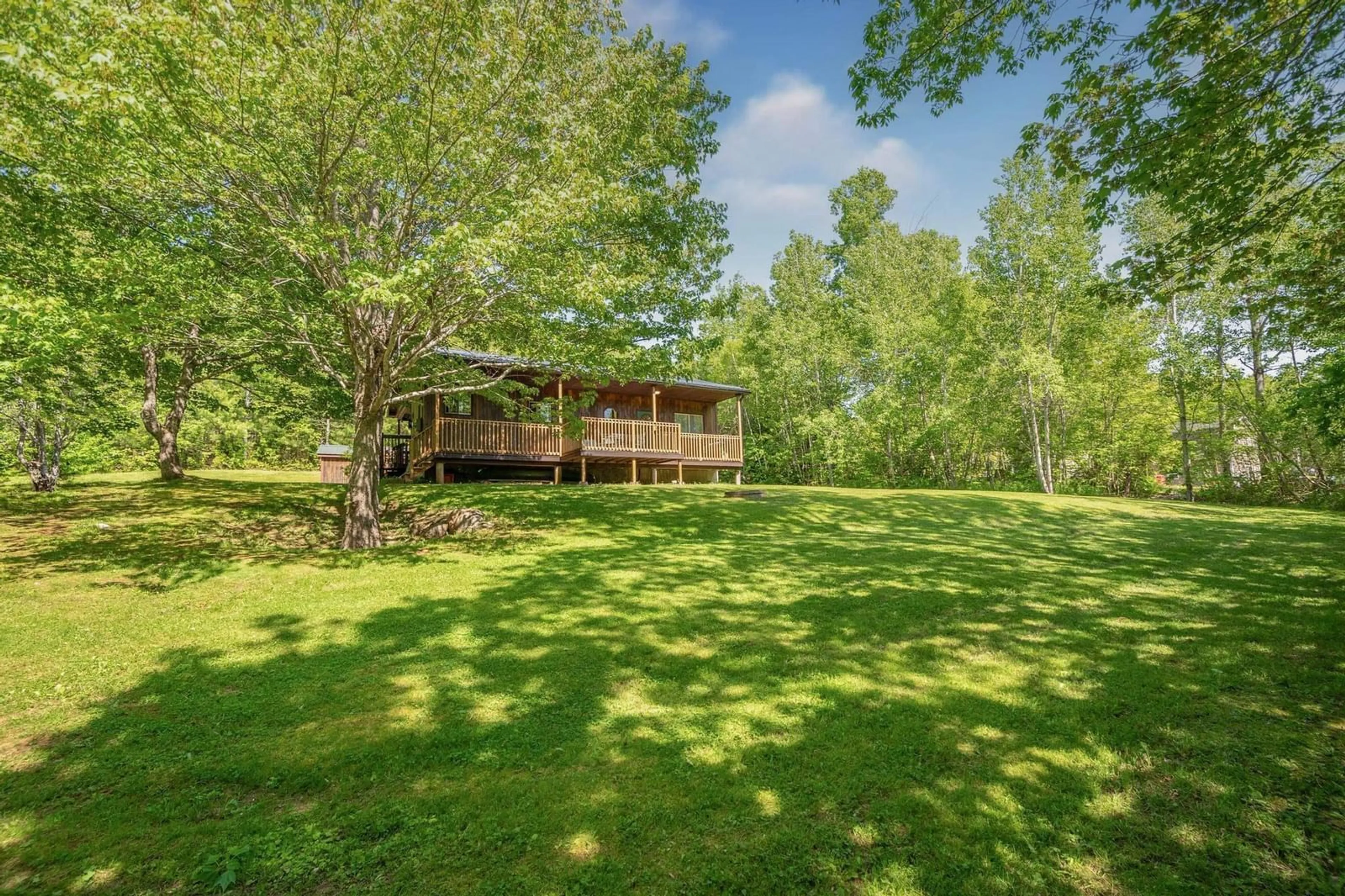 A pic from outside/outdoor area/front of a property/back of a property/a pic from drone, forest/trees view for 238 Trout Lake Road, West Inglisville Nova Scotia B0S 1M0