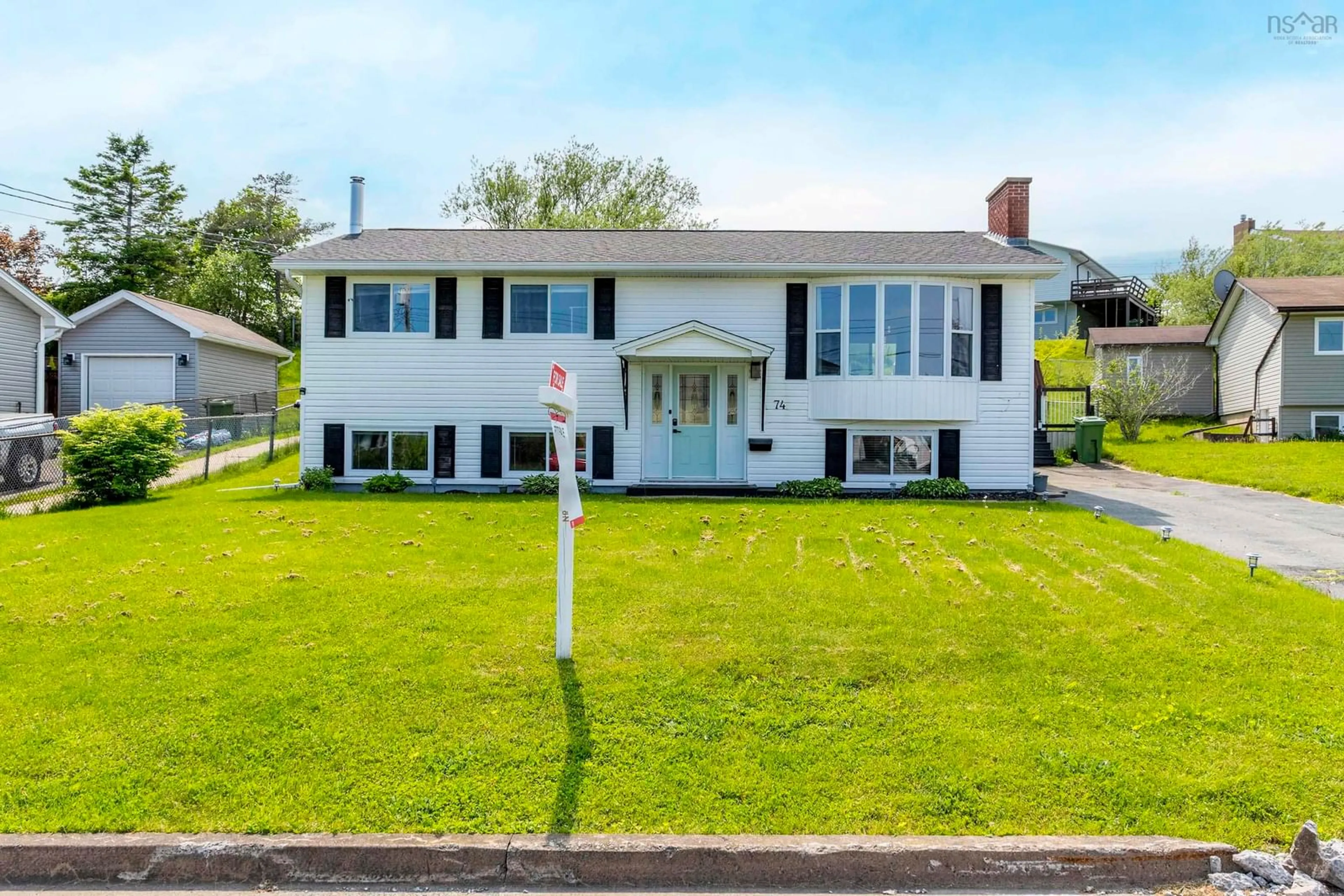 Home with vinyl exterior material, street for 74 Elm St, Cole Harbour Nova Scotia B2W 2K3