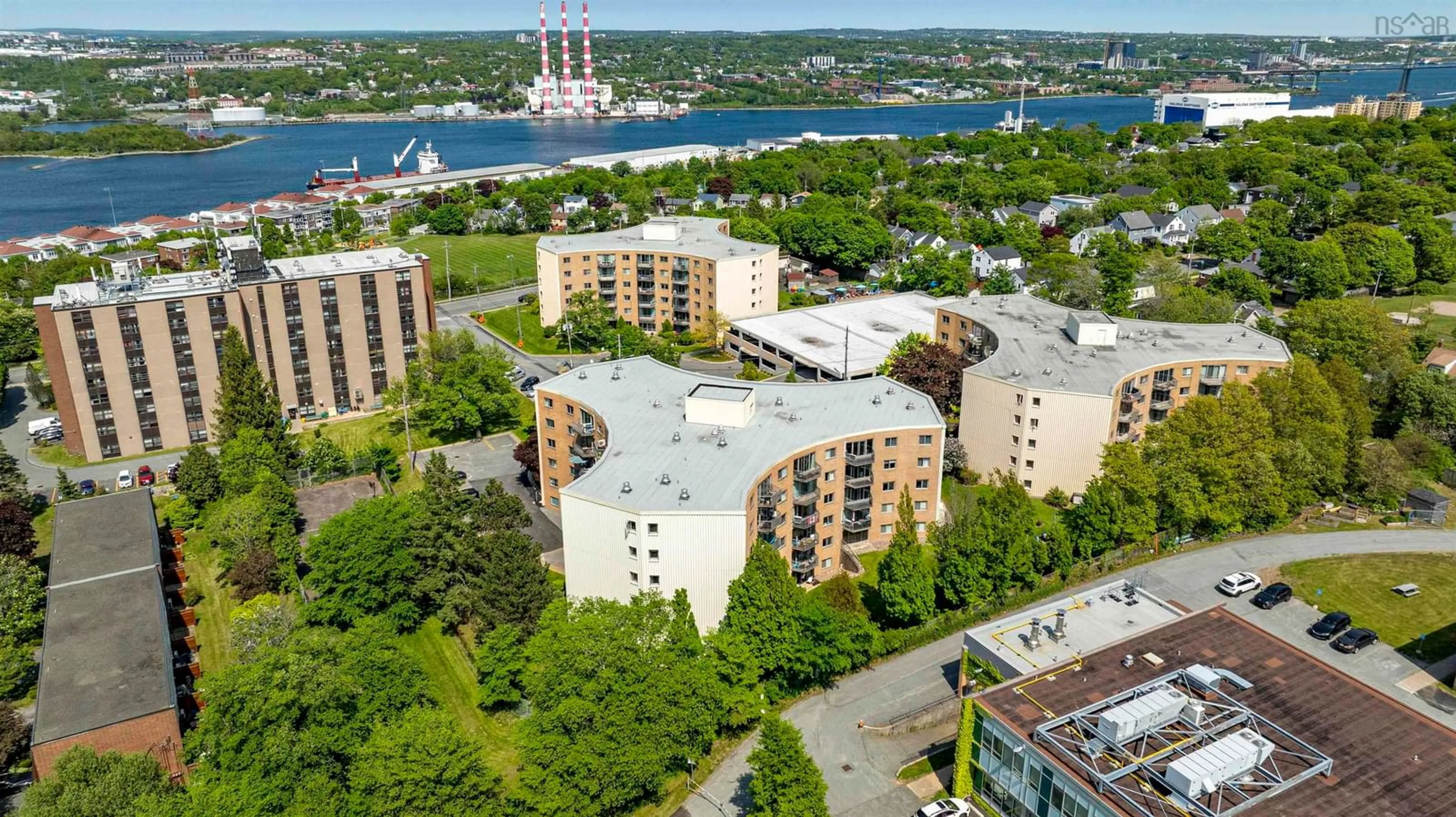 A pic from outside/outdoor area/front of a property/back of a property/a pic from drone, city buildings view from balcony for 5561 Heatherwood Crt #C201, North End Nova Scotia B3K 5N7