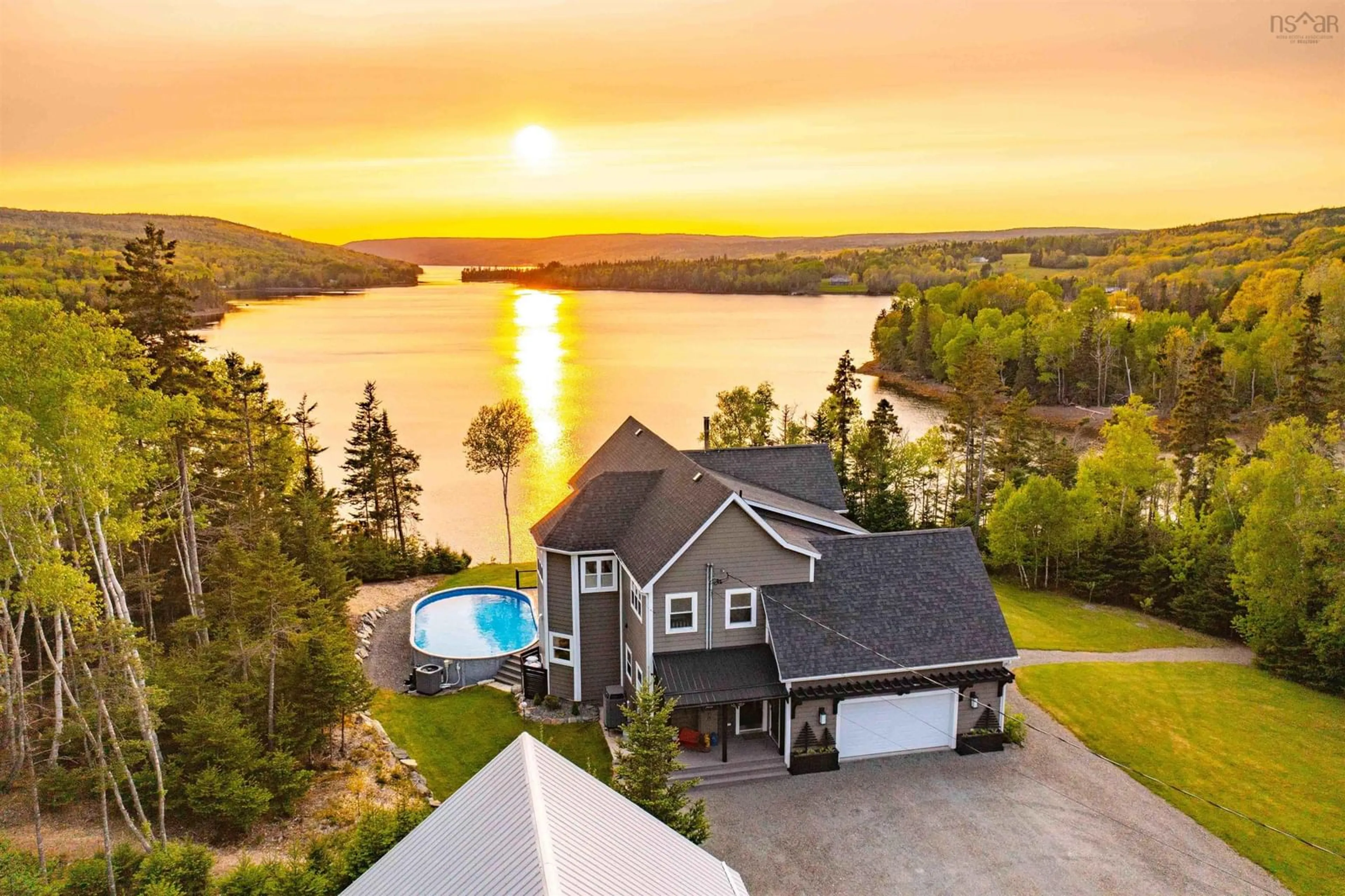 A pic from outside/outdoor area/front of a property/back of a property/a pic from drone, water/lake/river/ocean view for 2248 North Riverside Road, Boylston Nova Scotia B0H 1G0