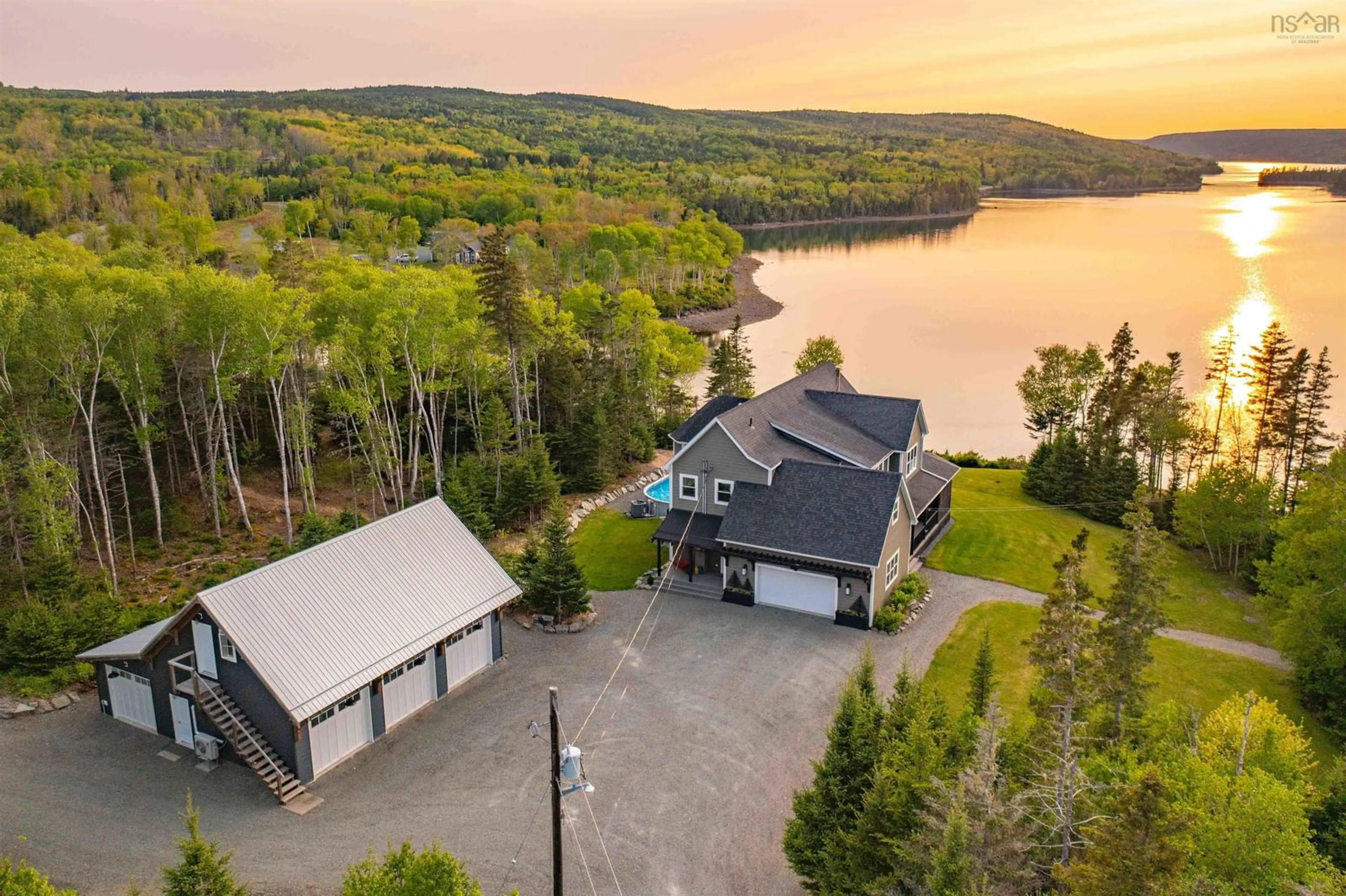 A pic from outside/outdoor area/front of a property/back of a property/a pic from drone, water/lake/river/ocean view for 2248 North Riverside Road, Boylston Nova Scotia B0H 1G0
