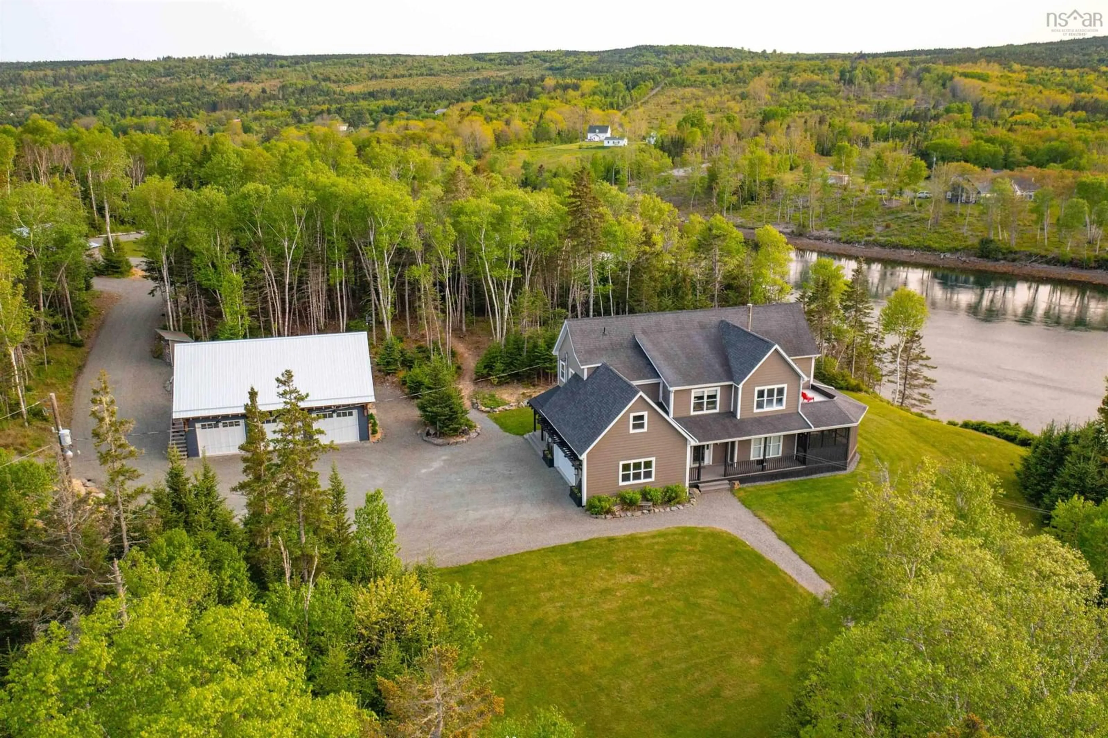 A pic from outside/outdoor area/front of a property/back of a property/a pic from drone, water/lake/river/ocean view for 2248 North Riverside Road, Boylston Nova Scotia B0H 1G0