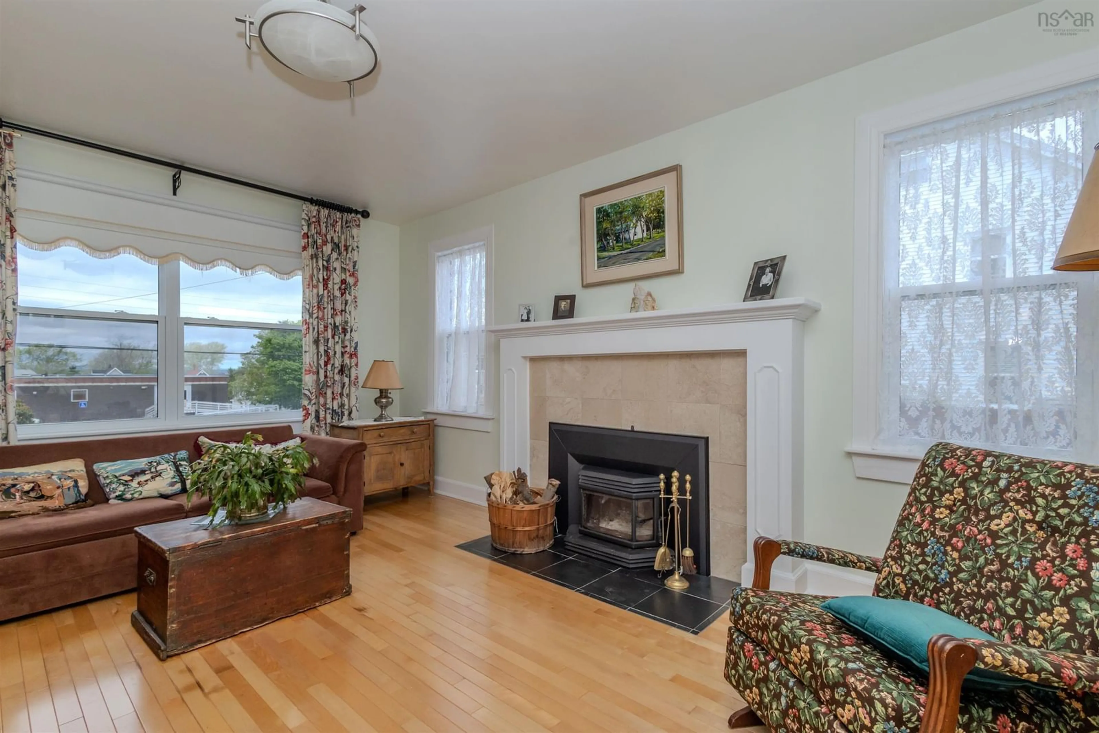 Living room with furniture, wood/laminate floor for 112 Howe St, Sydney Nova Scotia B1P 4V2