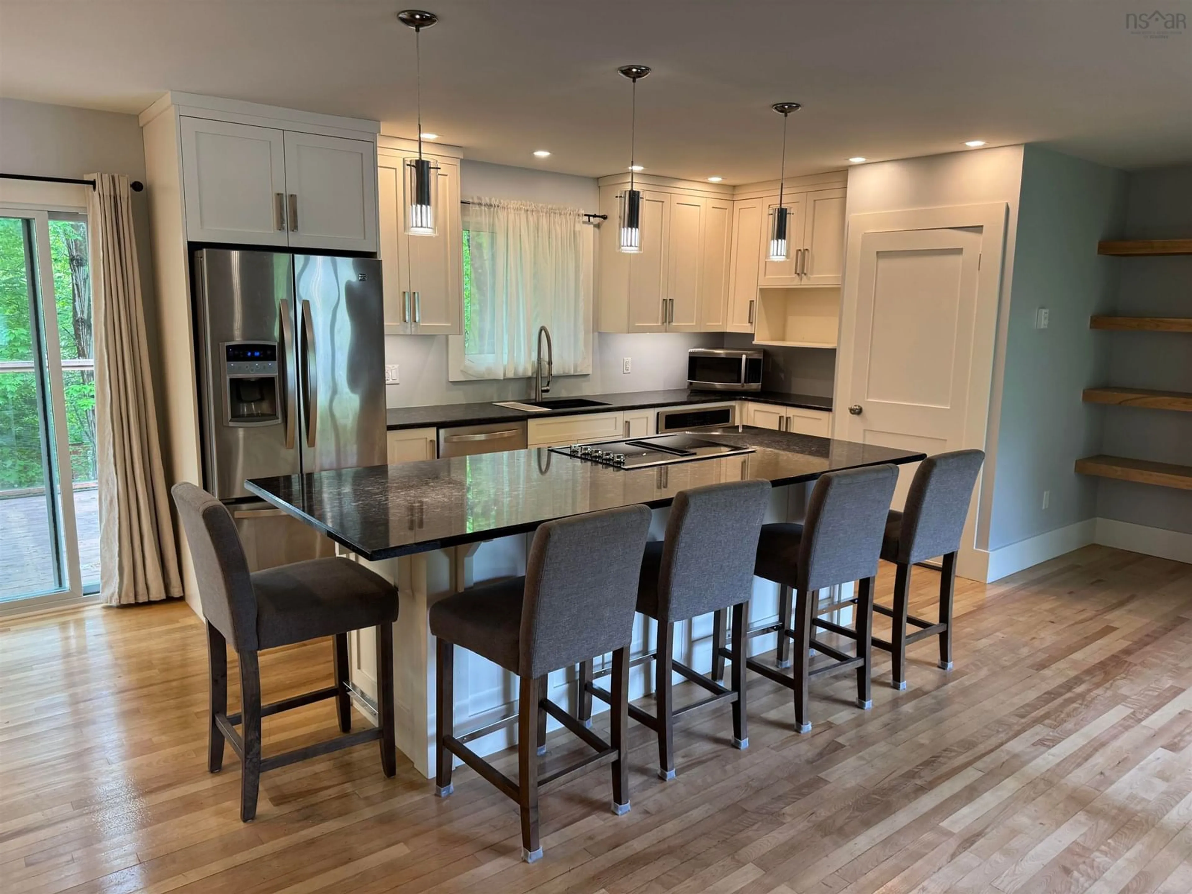 Open concept kitchen, wood/laminate floor for 97 Williams Lake Rd, Halifax Nova Scotia B3P 1T4