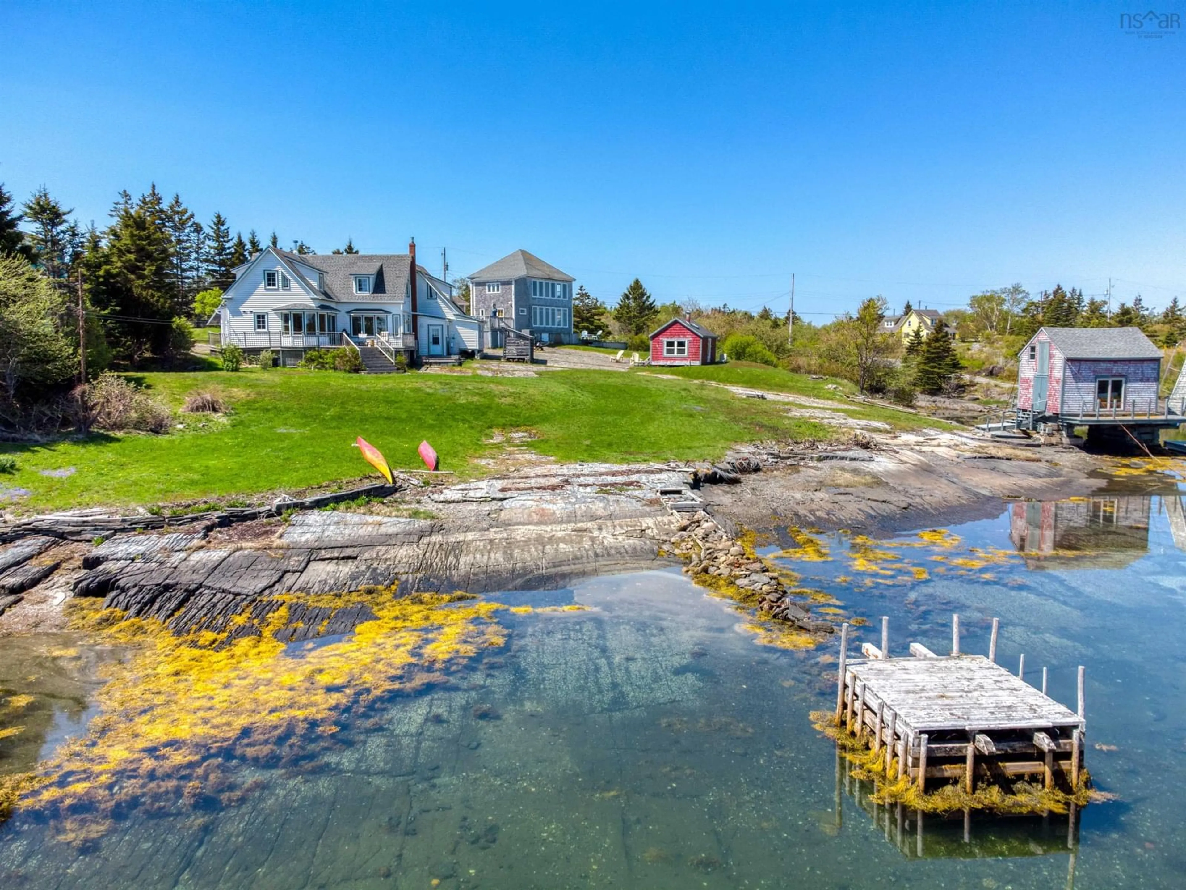 A pic from outside/outdoor area/front of a property/back of a property/a pic from drone, water/lake/river/ocean view for 399 South Side Rd, Stonehurst South Nova Scotia B0J 2C0