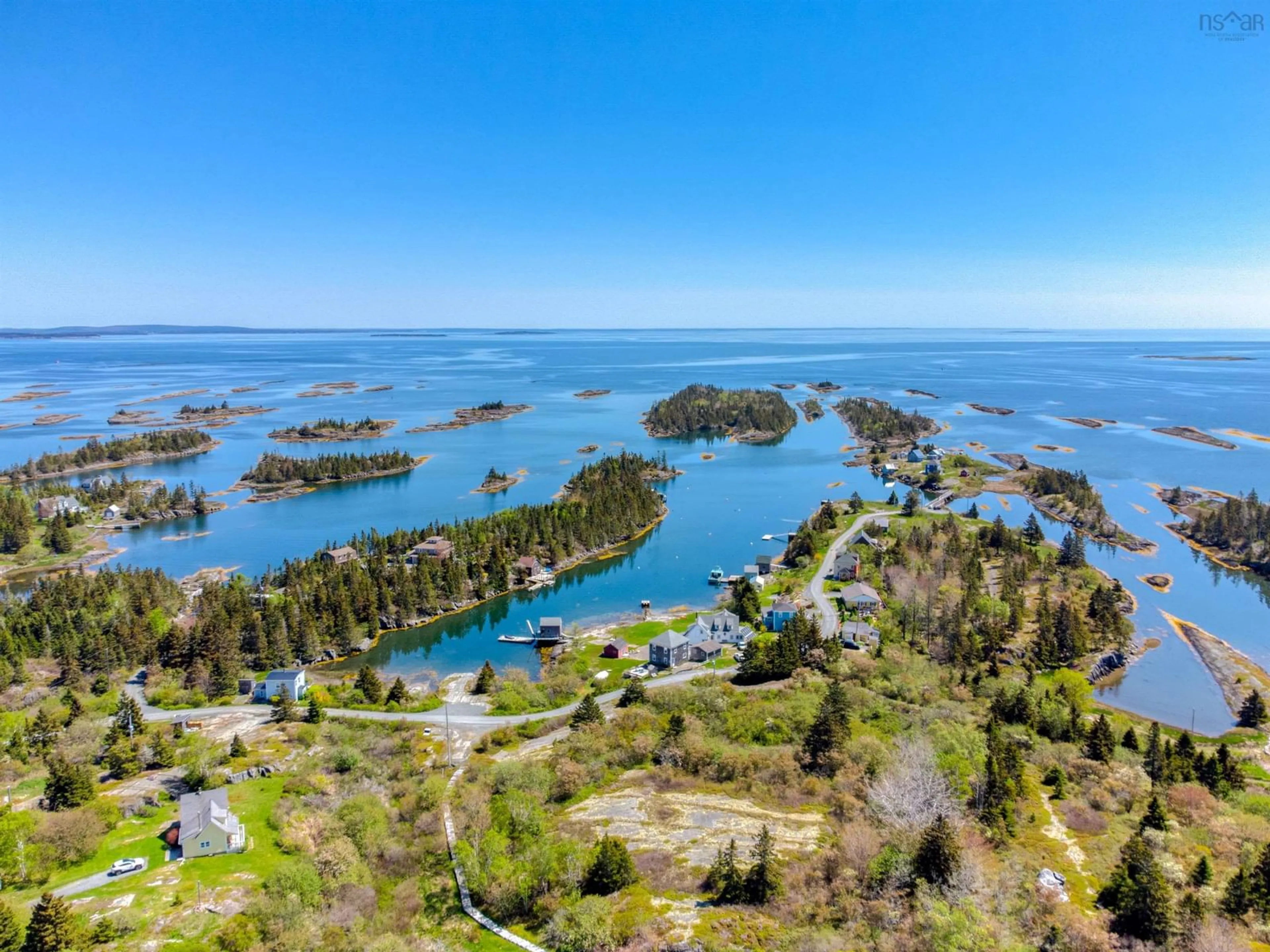 A pic from outside/outdoor area/front of a property/back of a property/a pic from drone, water/lake/river/ocean view for 399 South Side Rd, Stonehurst South Nova Scotia B0J 2C0