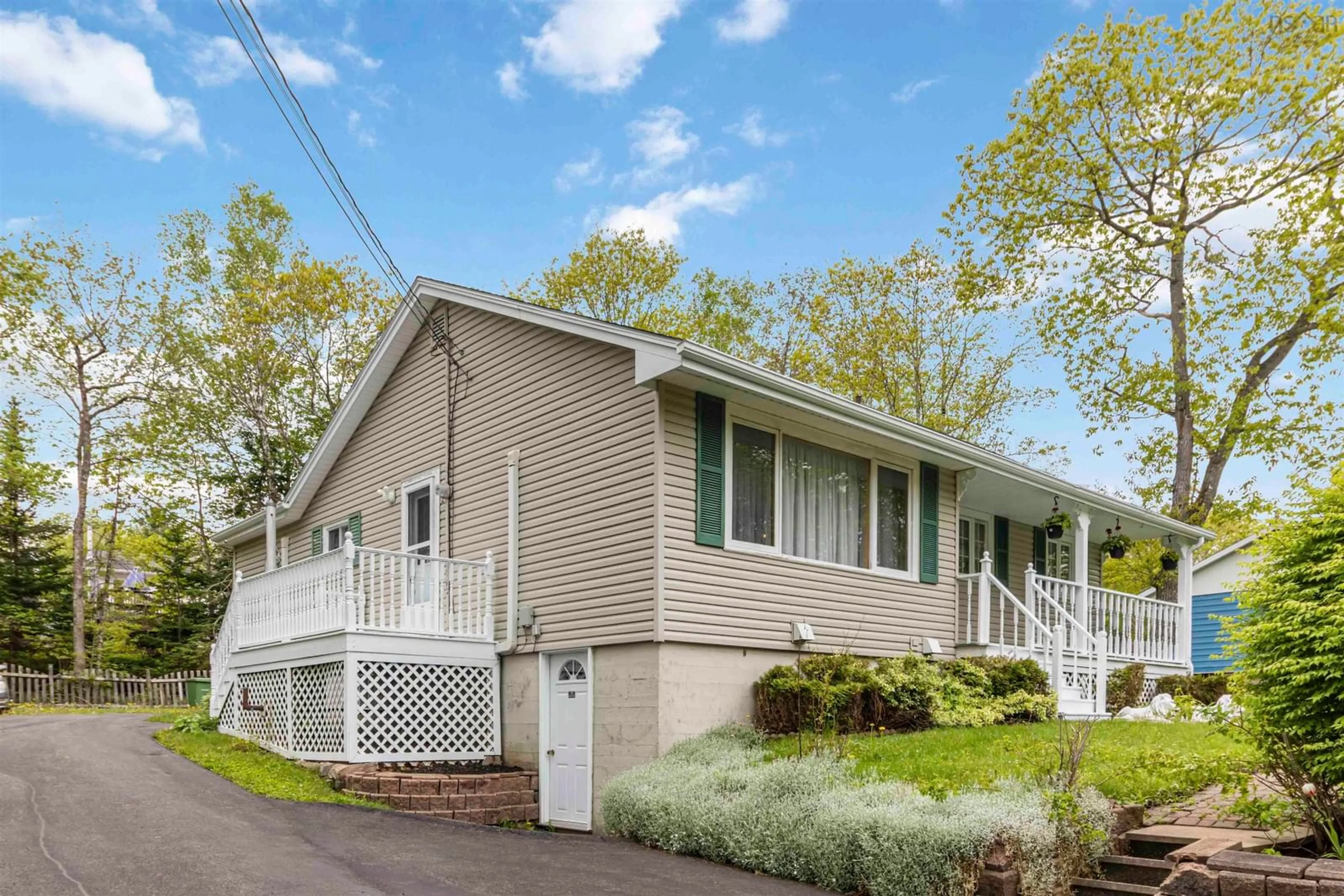 Home with vinyl exterior material, street for 64 Fraser Rd, Timberlea Nova Scotia B3T 1J4