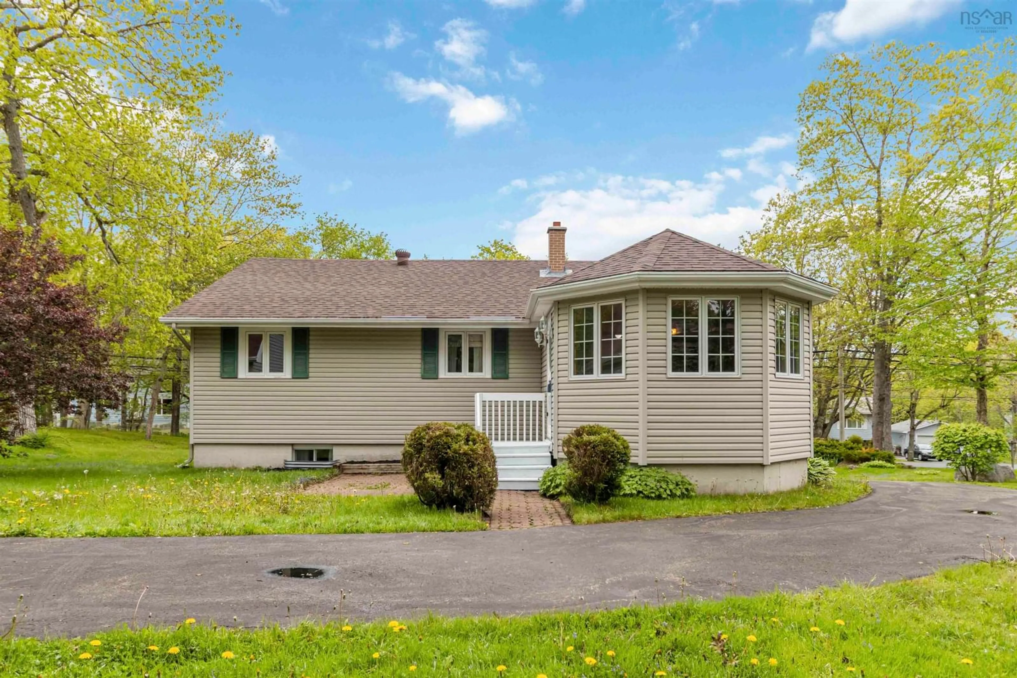 Home with vinyl exterior material, street for 64 Fraser Rd, Timberlea Nova Scotia B3T 1J4