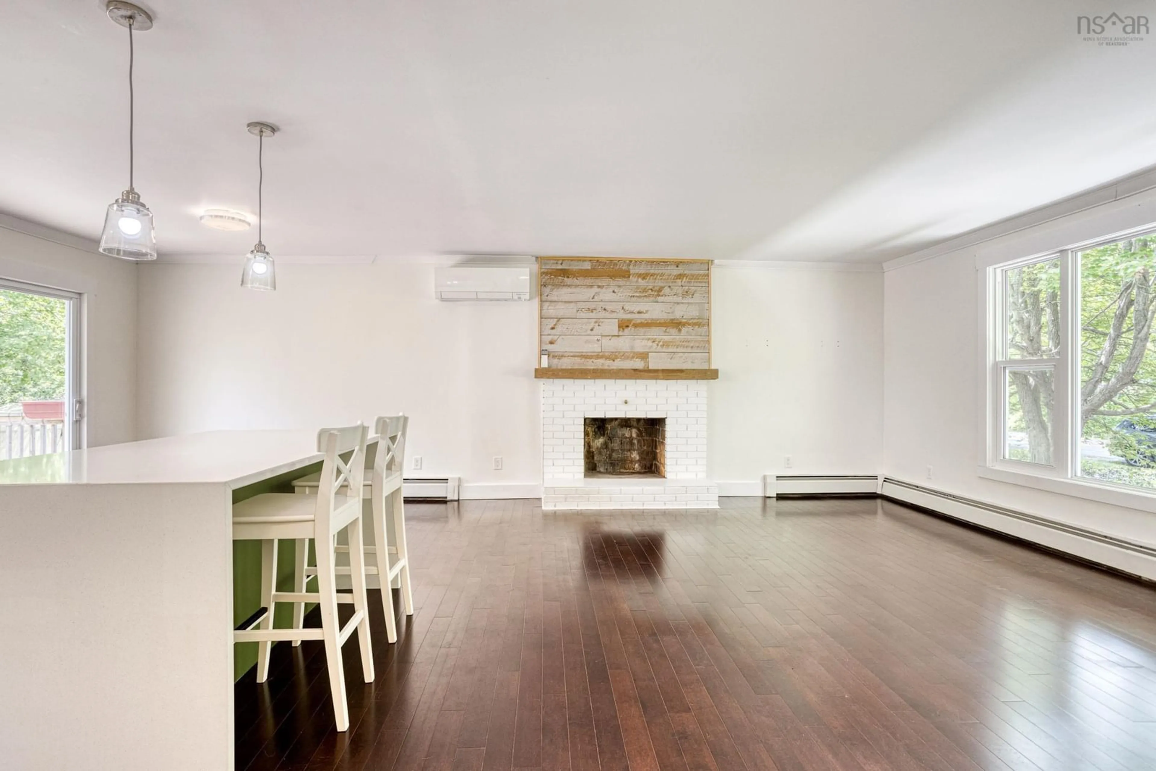 Living room with furniture, wood/laminate floor for 65 Union St, Bedford Nova Scotia B4A 2B6