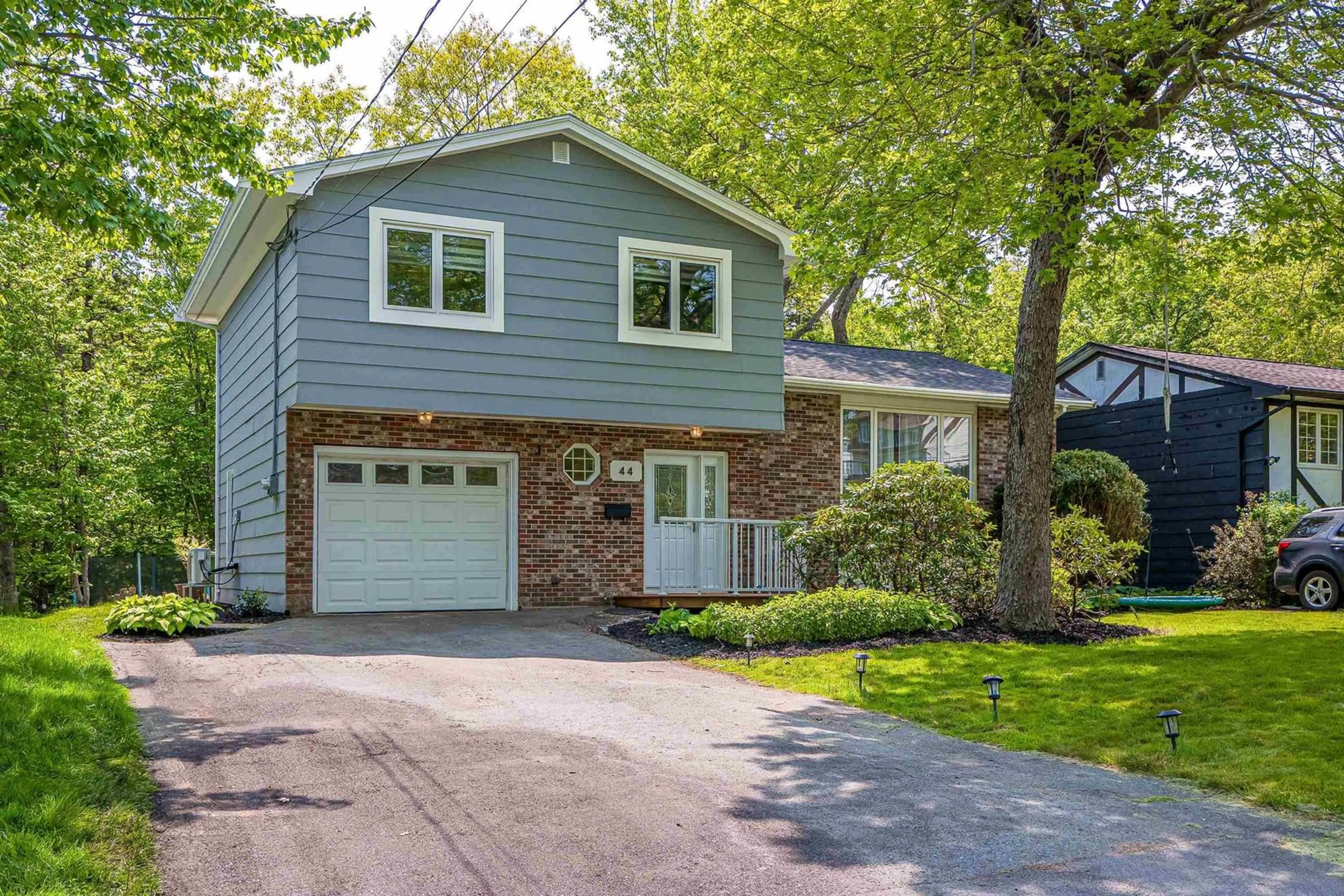 Home with vinyl exterior material, street for 44 Sunrise Hill, Bedford Nova Scotia B4A 1V1