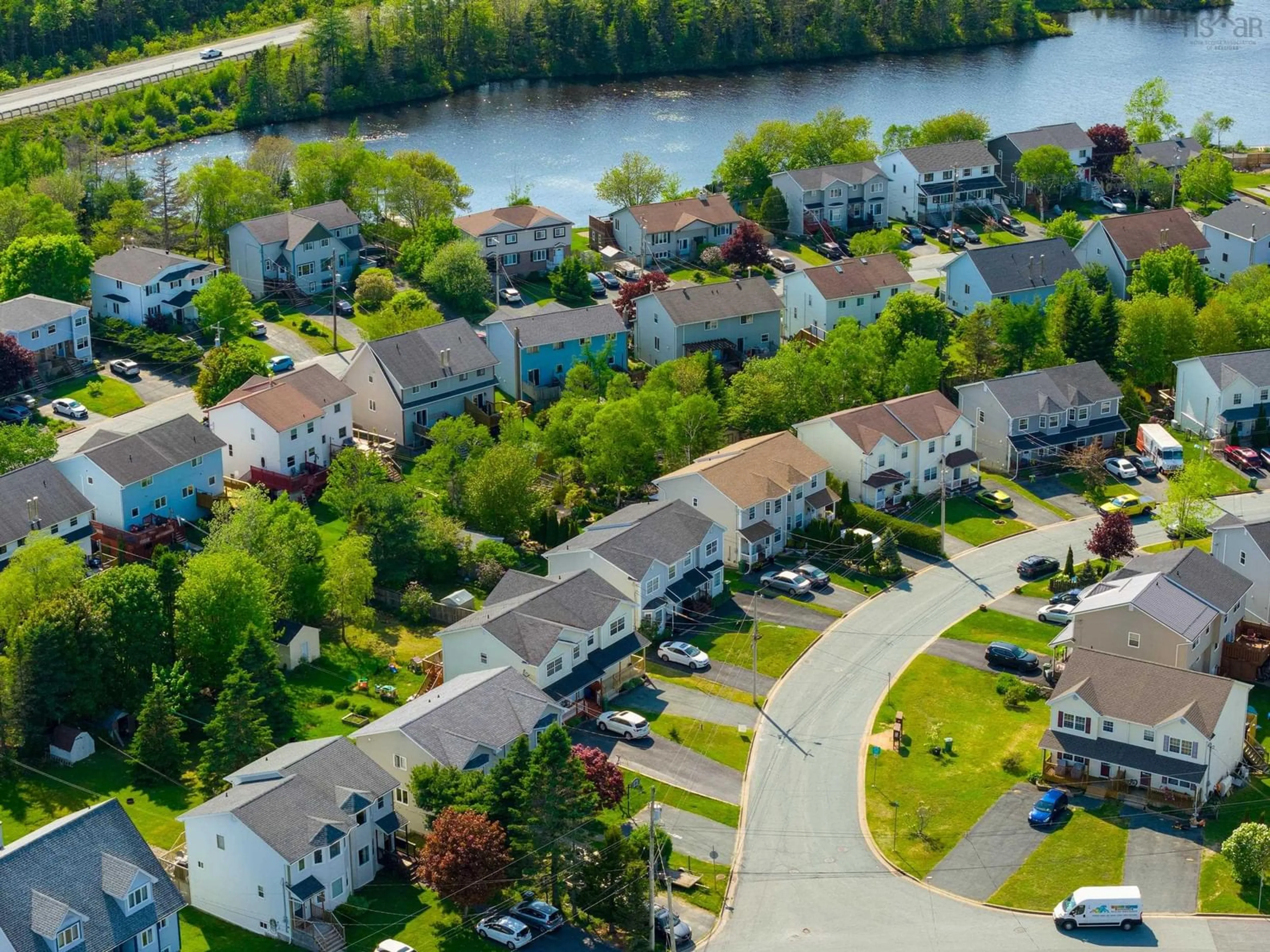A pic from outside/outdoor area/front of a property/back of a property/a pic from drone, water/lake/river/ocean view for 8 Yoon Crt, Timberlea Nova Scotia B3T 1G5