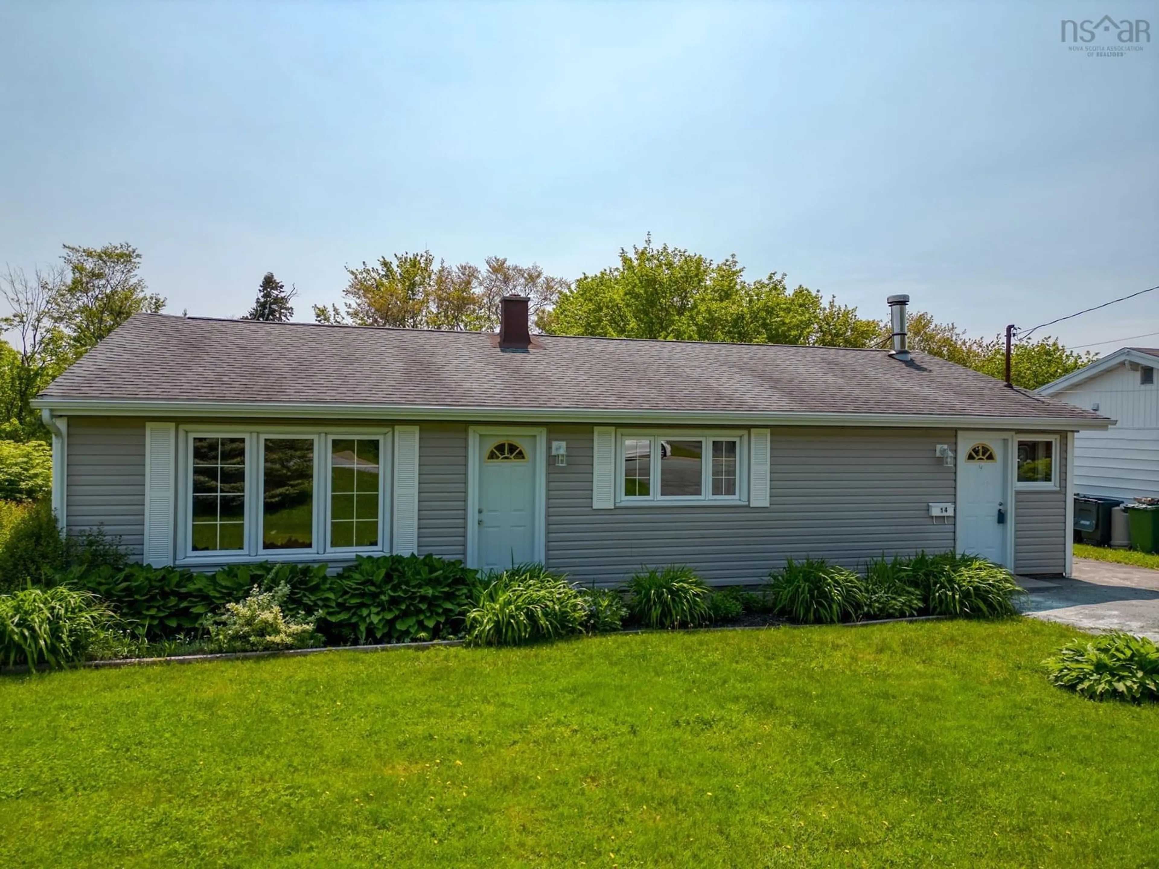Home with vinyl exterior material, street for 14 Inverary Dr, Dartmouth Nova Scotia B2X 1H2