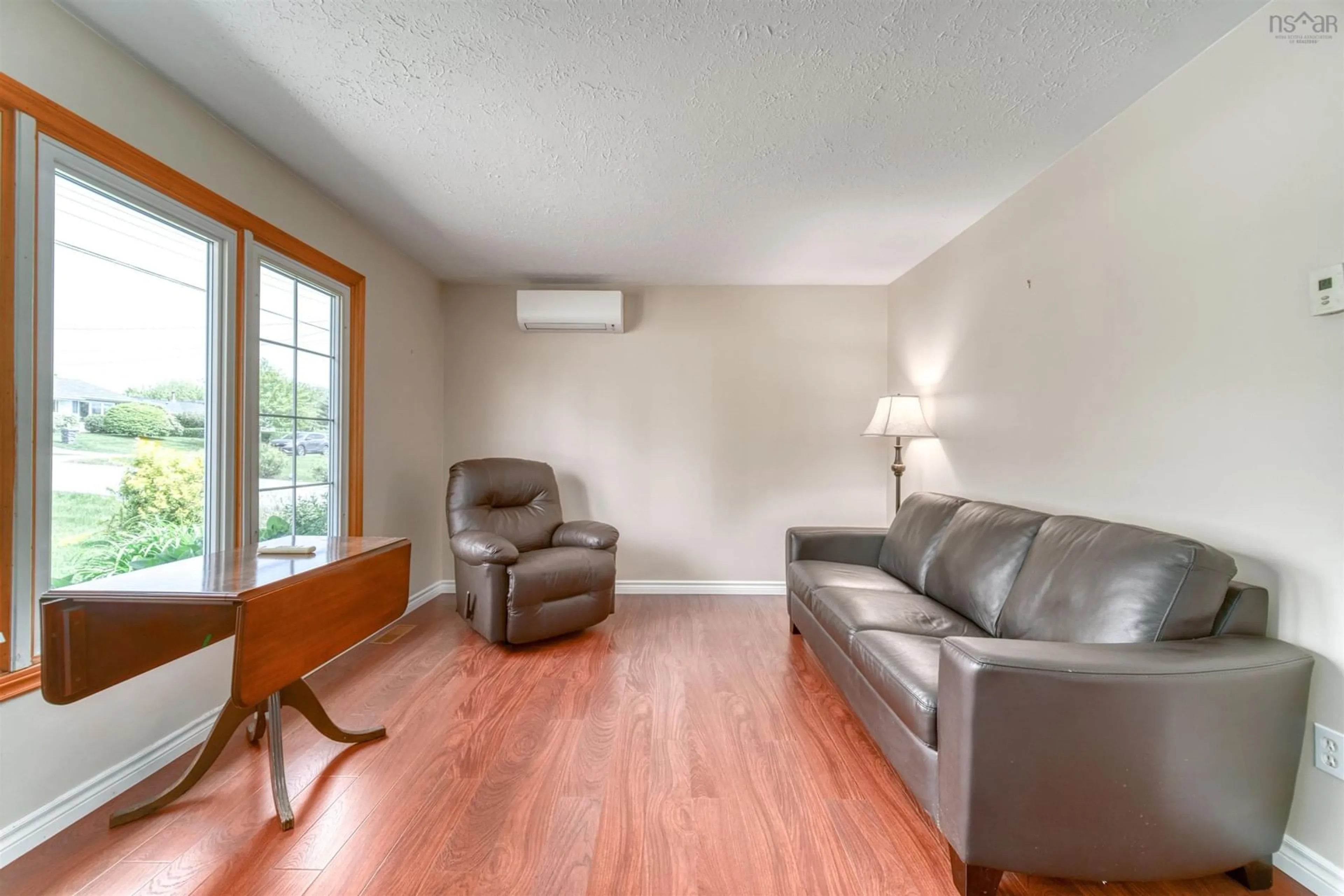 Living room with furniture, wood/laminate floor for 14 Inverary Dr, Dartmouth Nova Scotia B2X 1H2