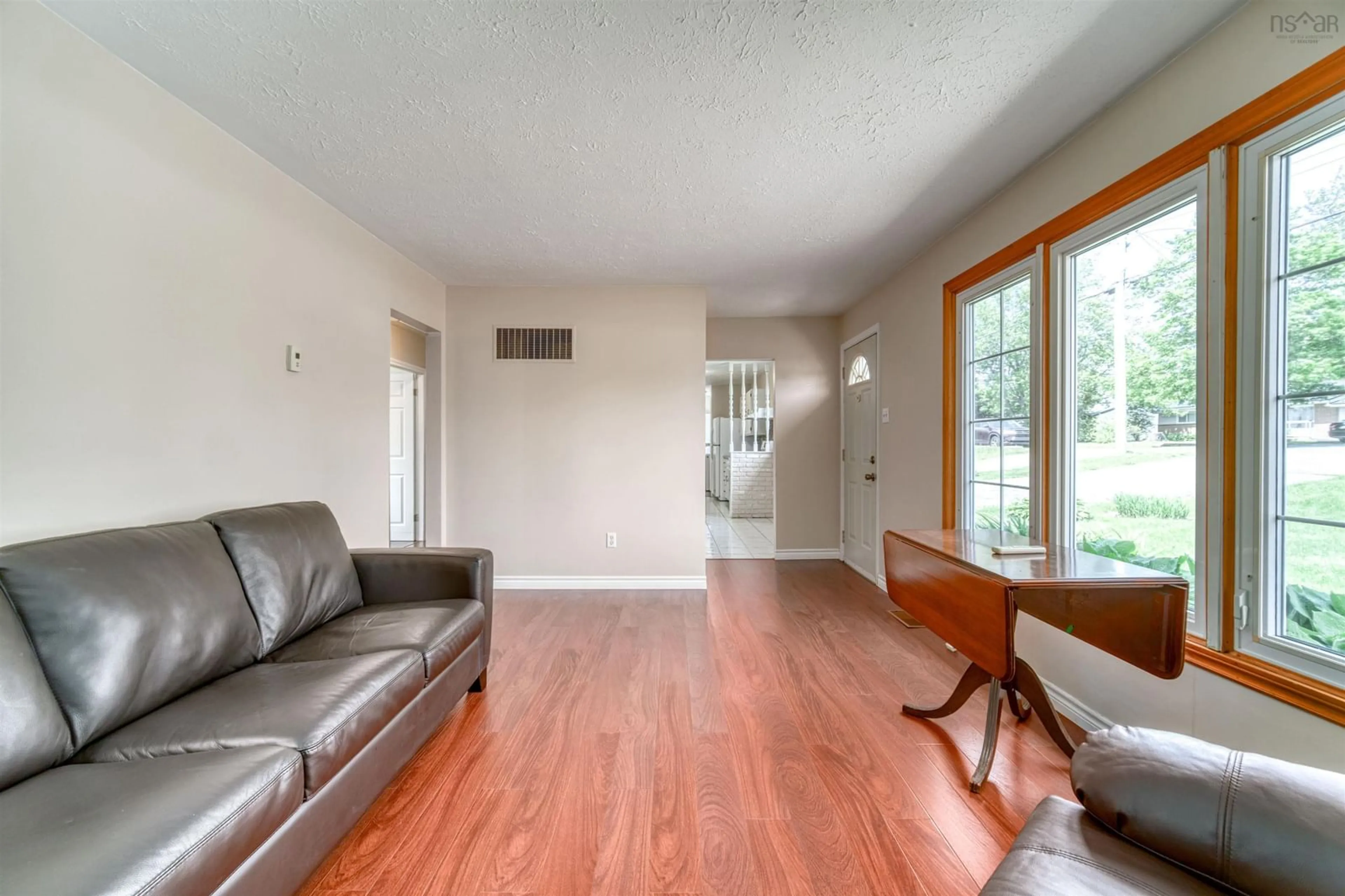 Living room with furniture, wood/laminate floor for 14 Inverary Dr, Dartmouth Nova Scotia B2X 1H2