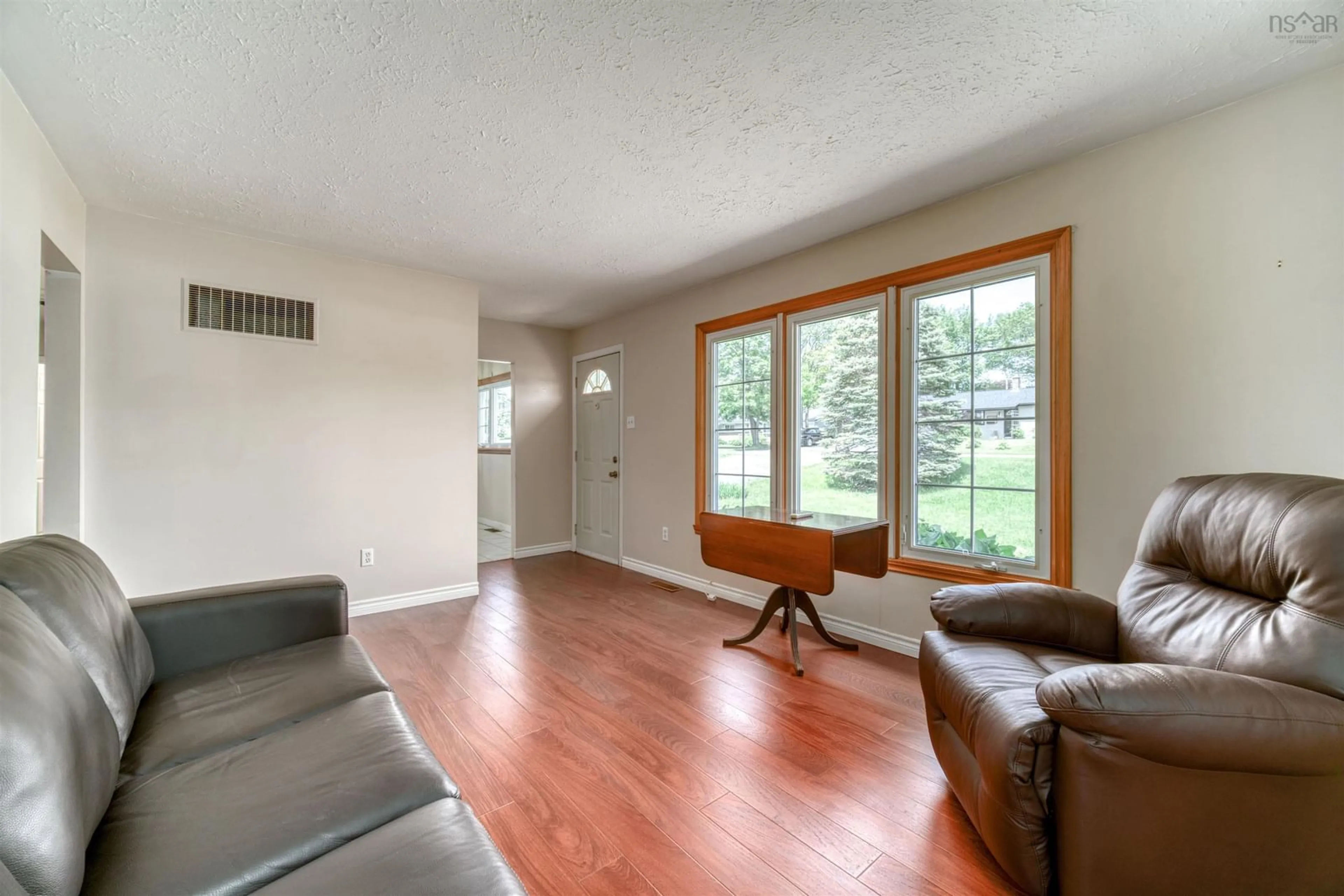 Living room with furniture, wood/laminate floor for 14 Inverary Dr, Dartmouth Nova Scotia B2X 1H2